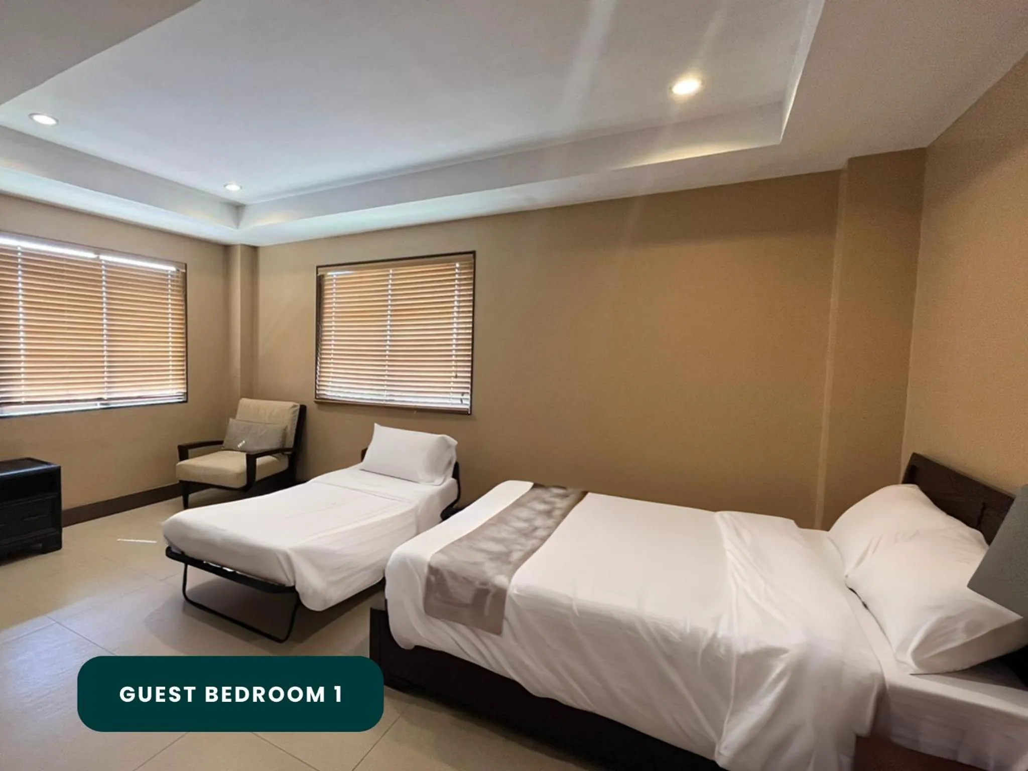 Bed in Coralpoint Gardens Suites & Residences