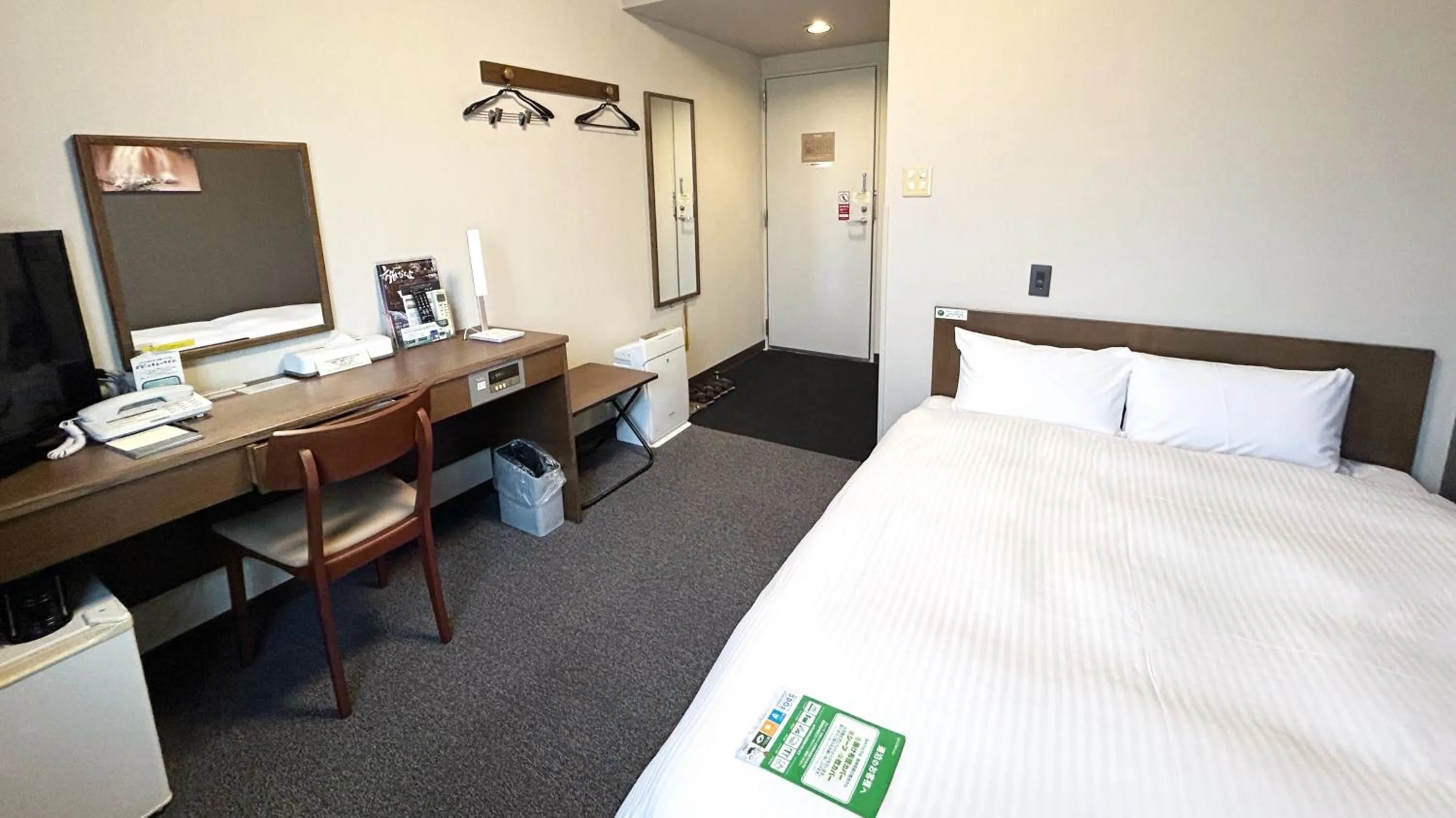 Photo of the whole room, Bed in Hotel Route-Inn Myoko Arai