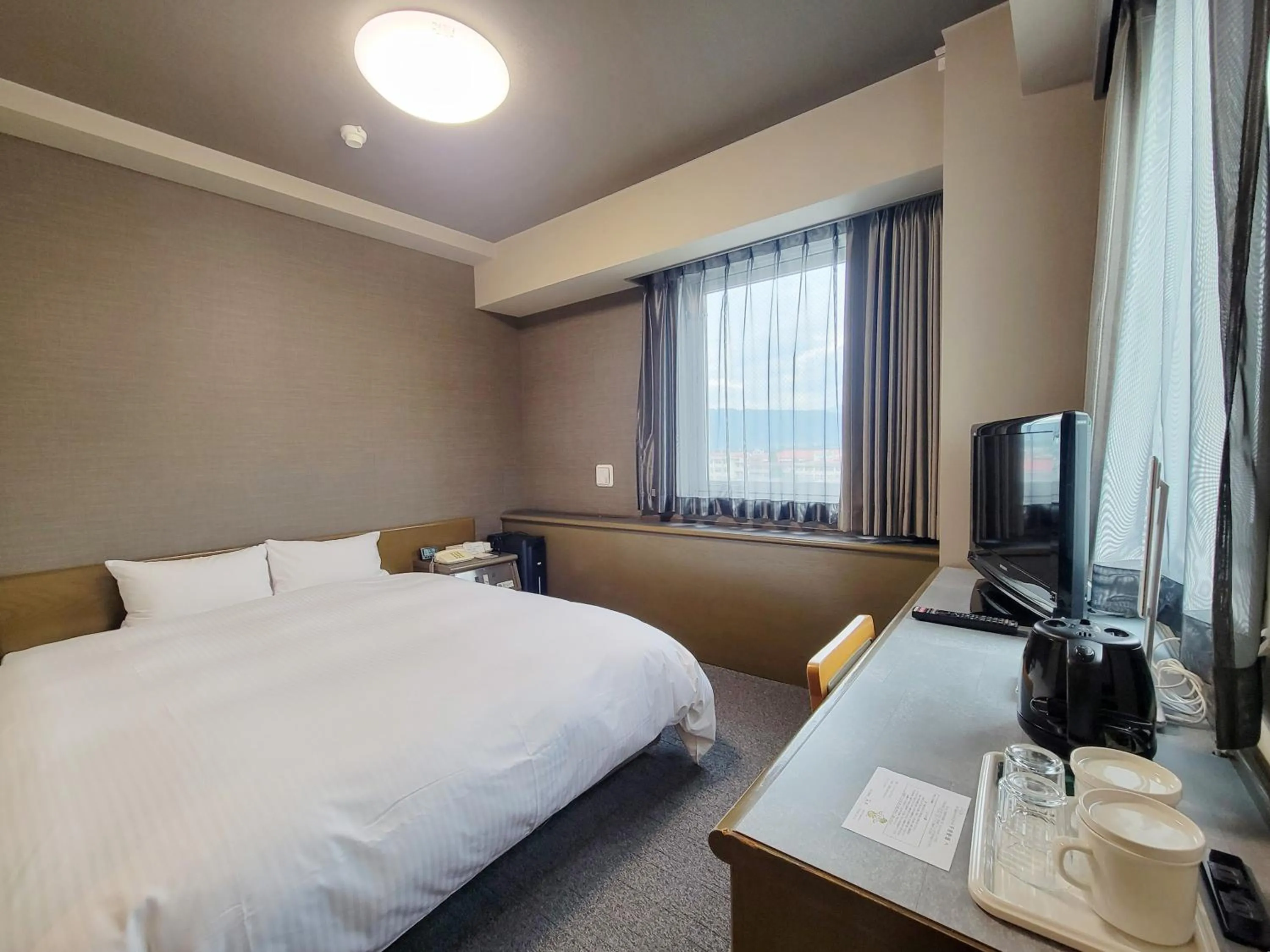 Photo of the whole room, Bed in Hotel Route-Inn Court Chikuma-Koshoku