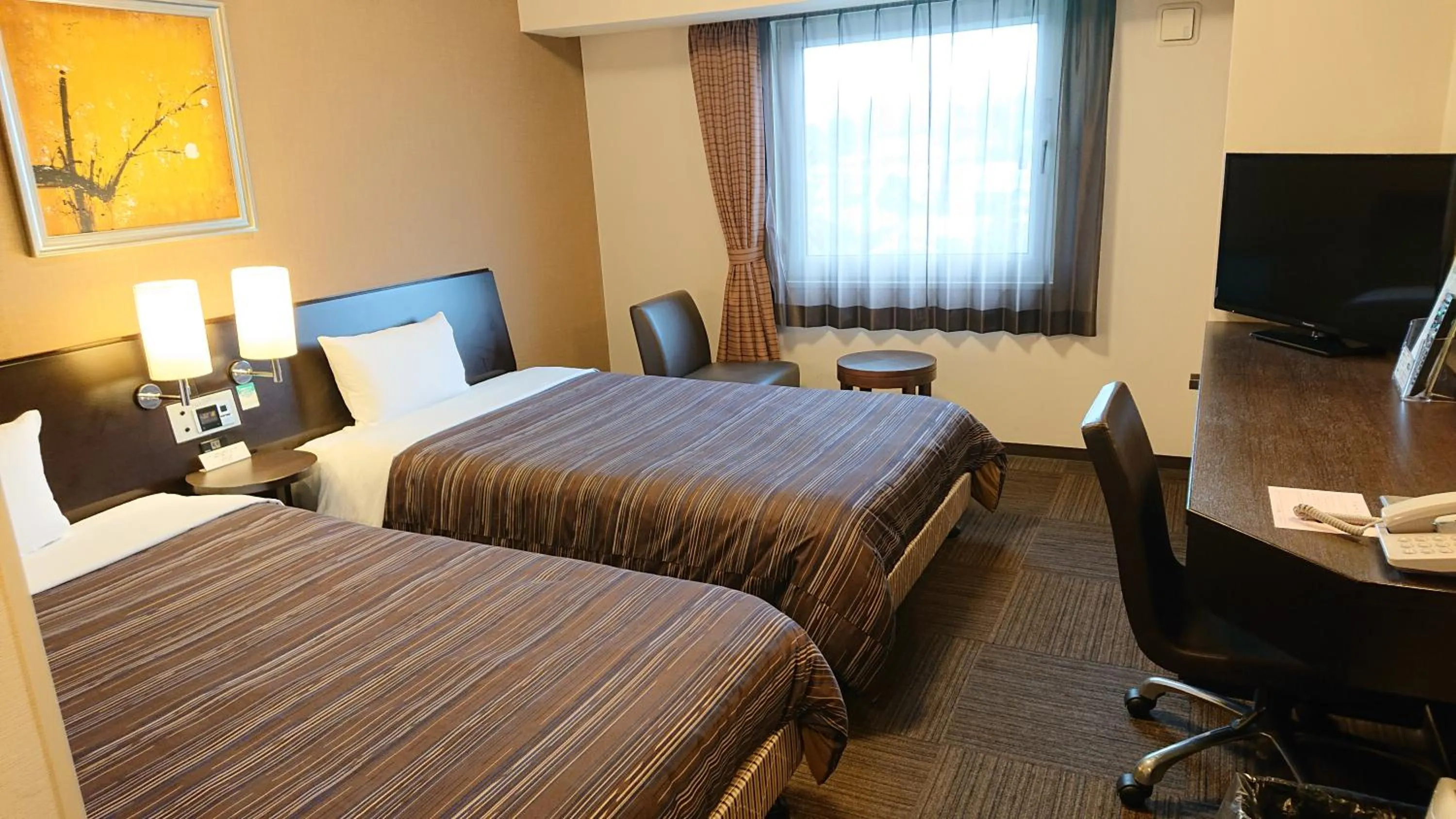 Bed in Route Inn Grantia Wakuranoyado Igauenojomae