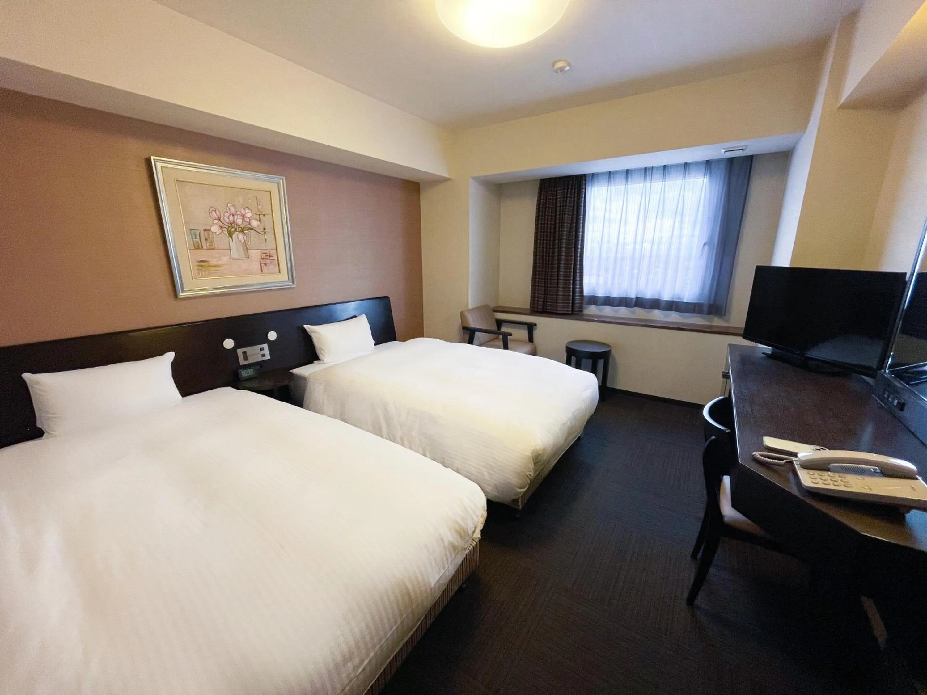 Photo of the whole room, Bed in Route Inn Grantia Himi Wakuranoyado