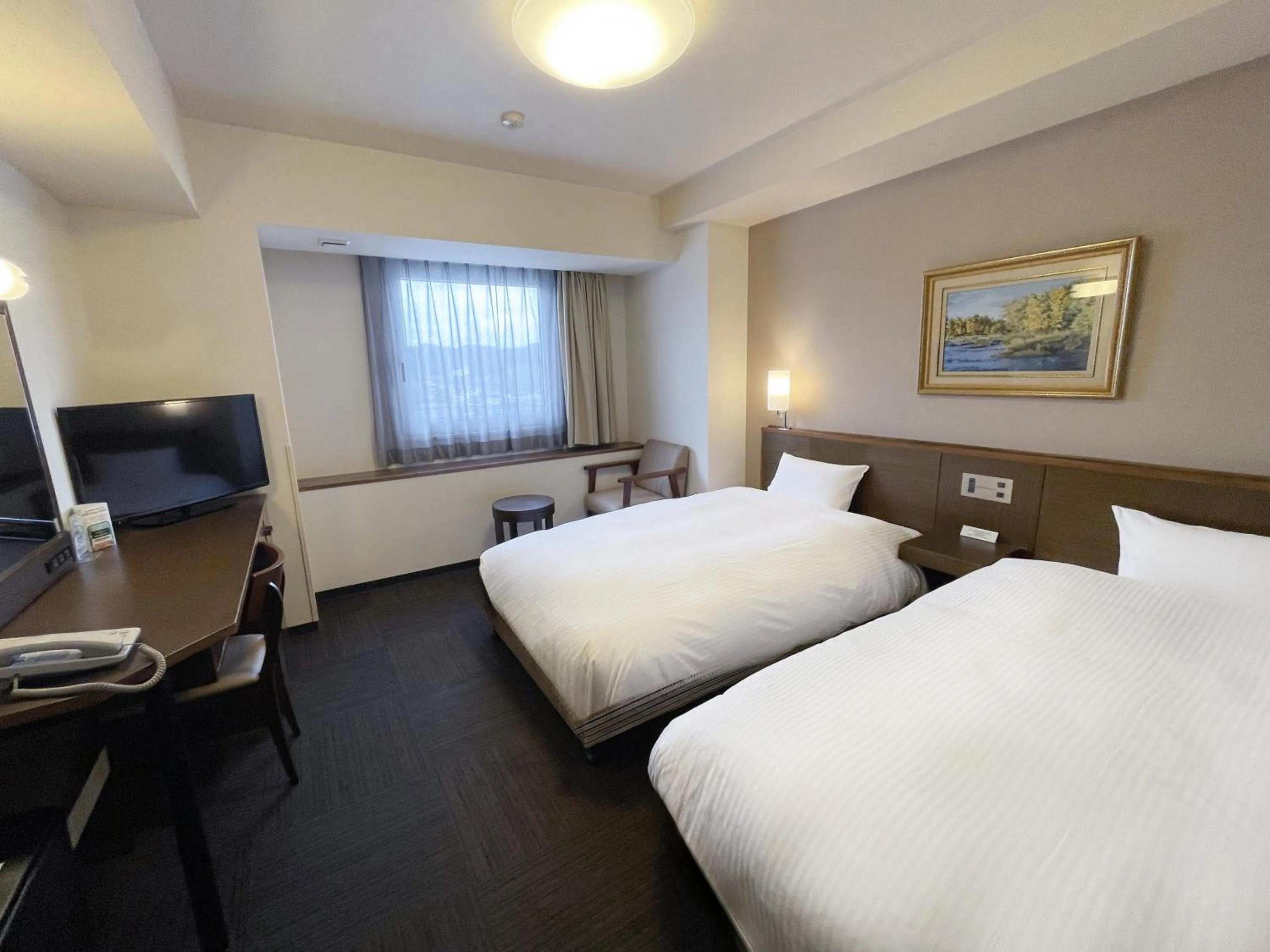 Photo of the whole room, Bed in Route Inn Grantia Himi Wakuranoyado