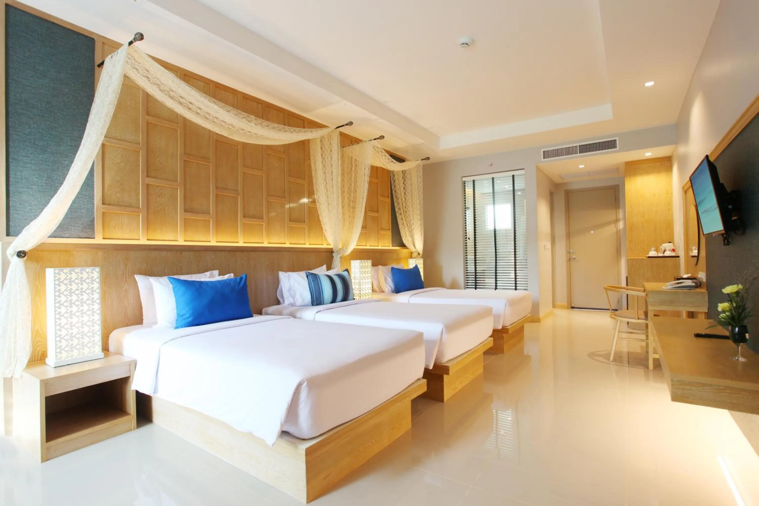 Photo of the whole room, Bed in CRAFT Resort & Villas, Phuket Town