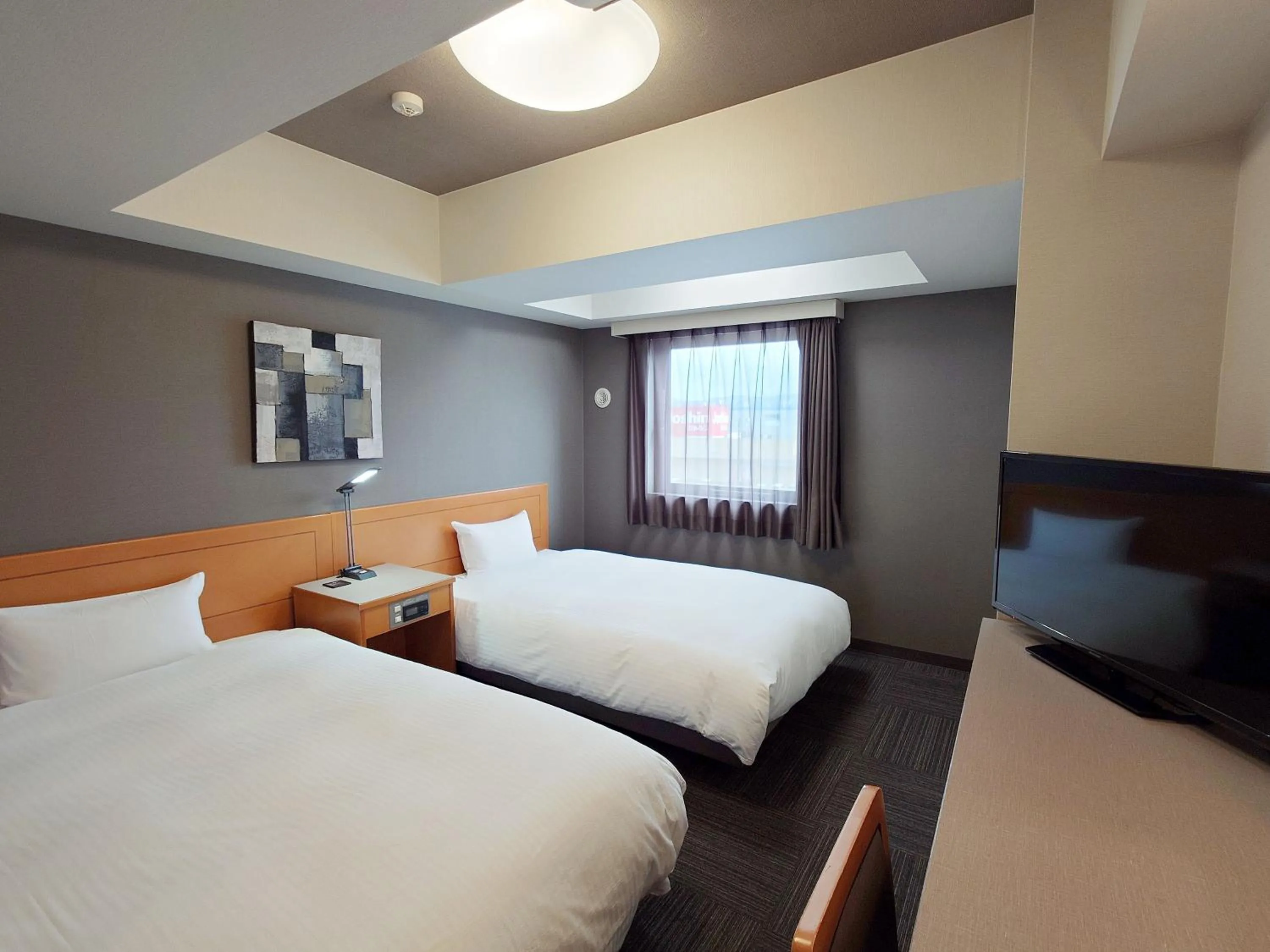 Photo of the whole room, Bed in Hotel Route-Inn Nagaoka Inter