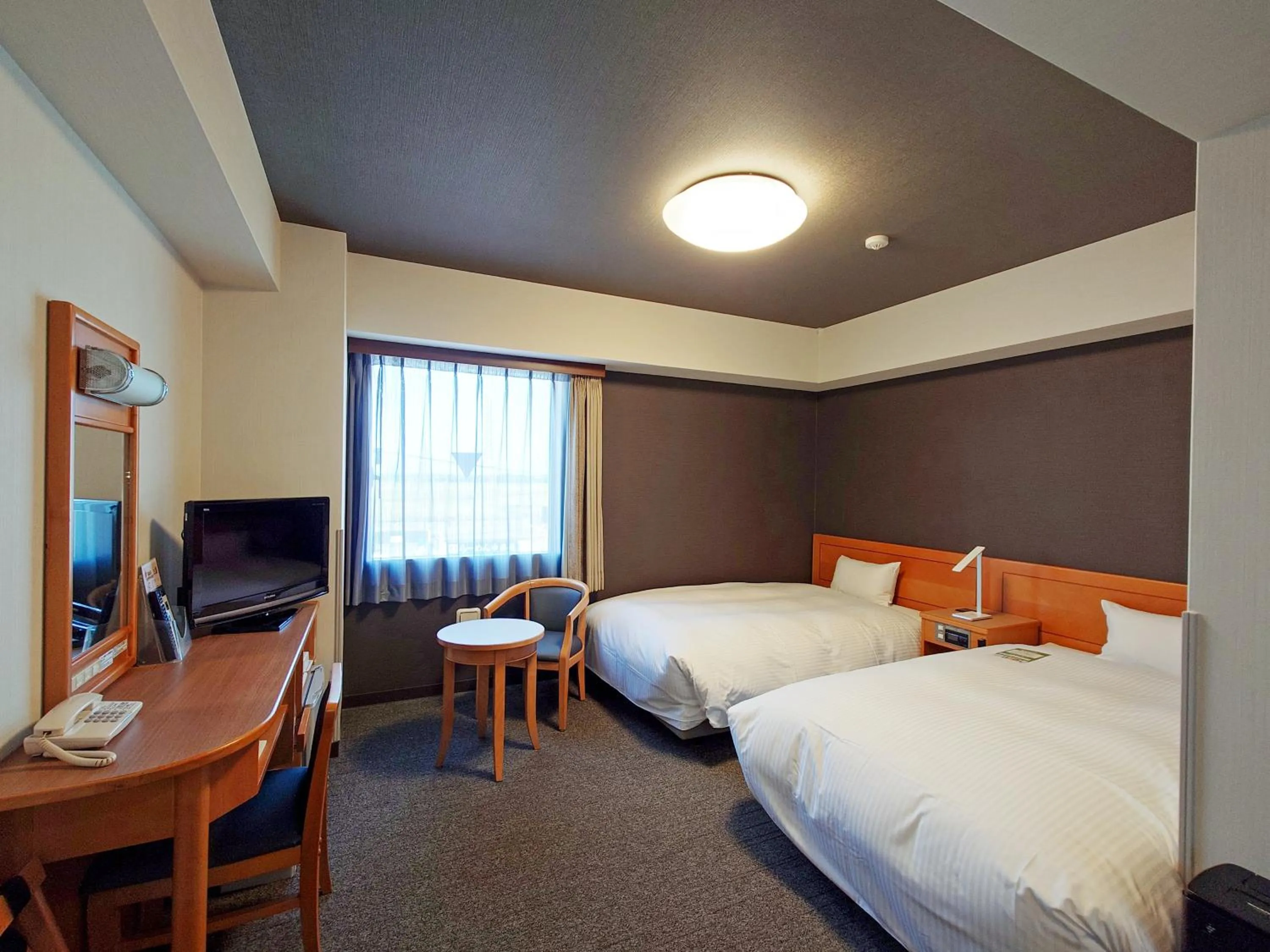 Photo of the whole room, Bed in Hotel Route-Inn Shibata Inter