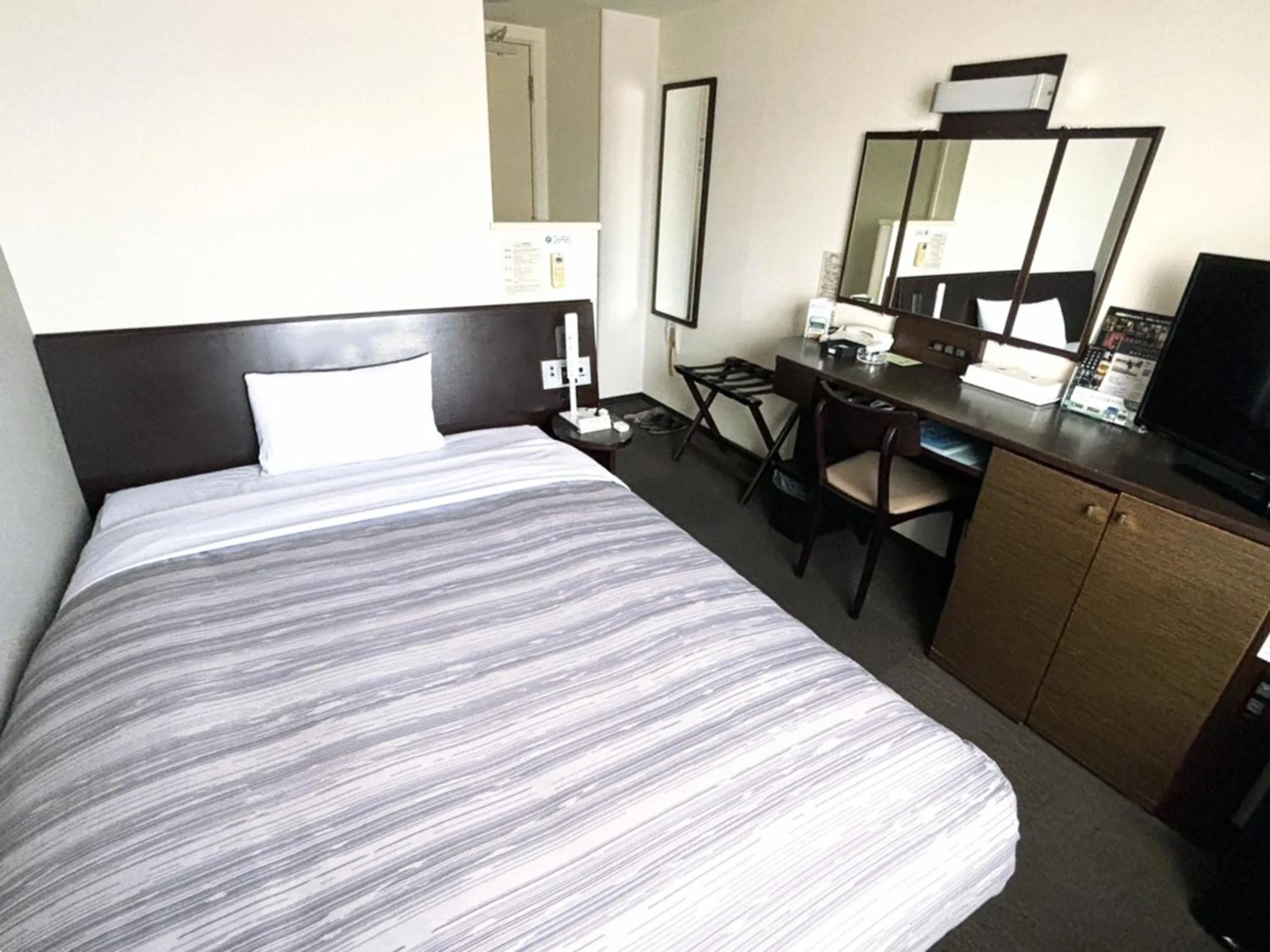 Photo of the whole room, Bed in Hotel Route-Inn Shibukawa