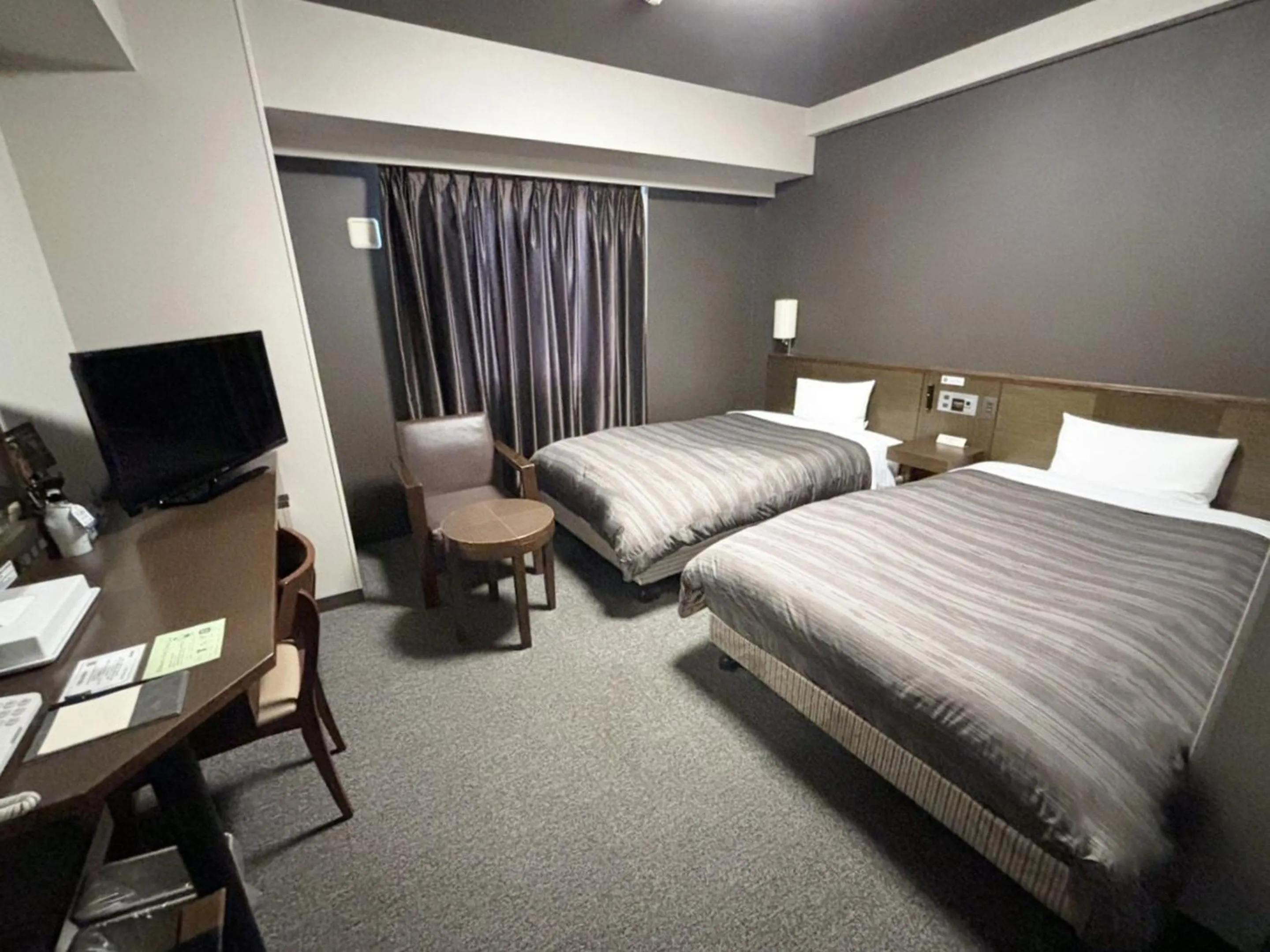 Photo of the whole room, Bed in Hotel Route-Inn Shibukawa