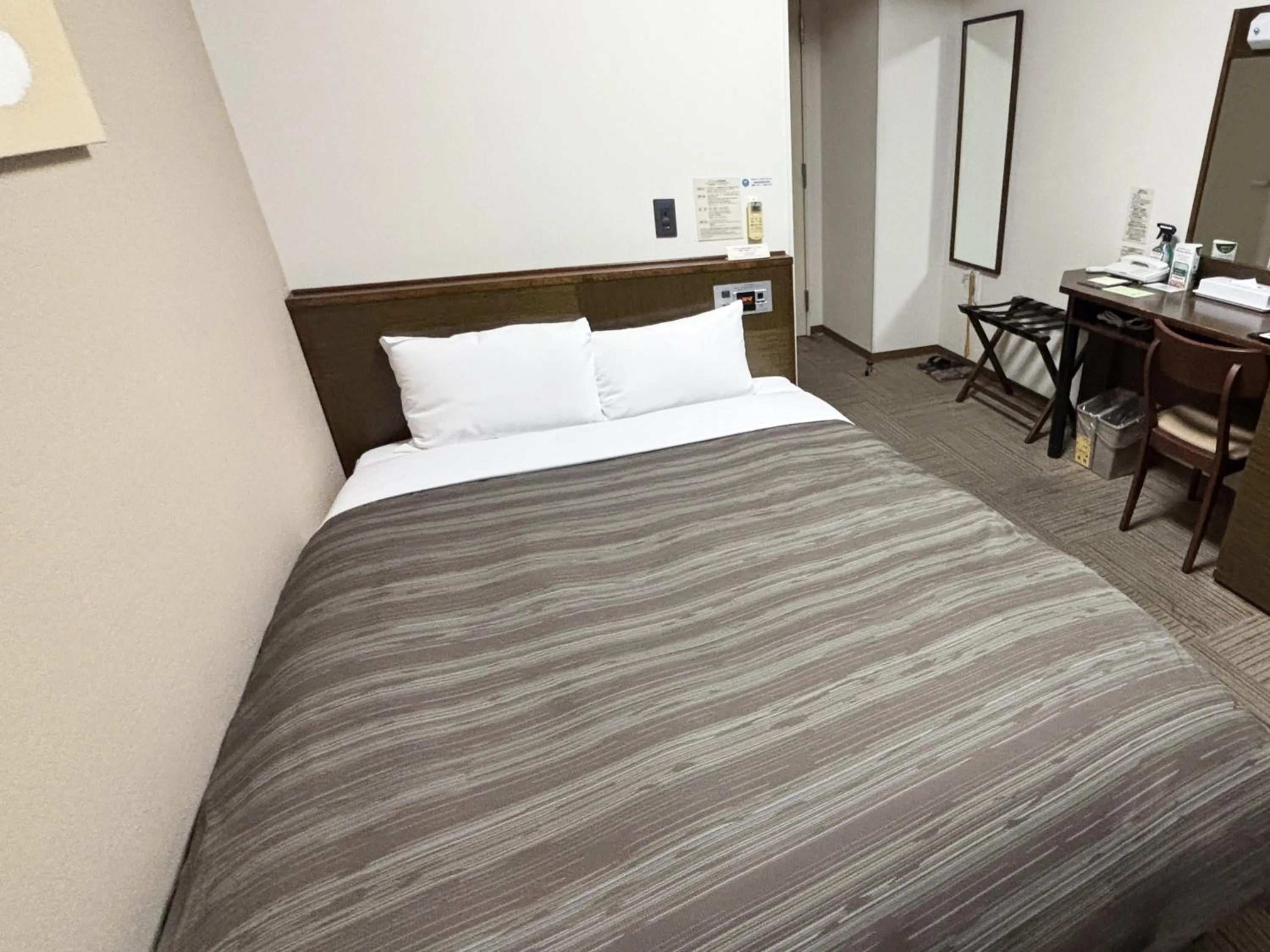 Photo of the whole room, Bed in Hotel Route-Inn Shibukawa