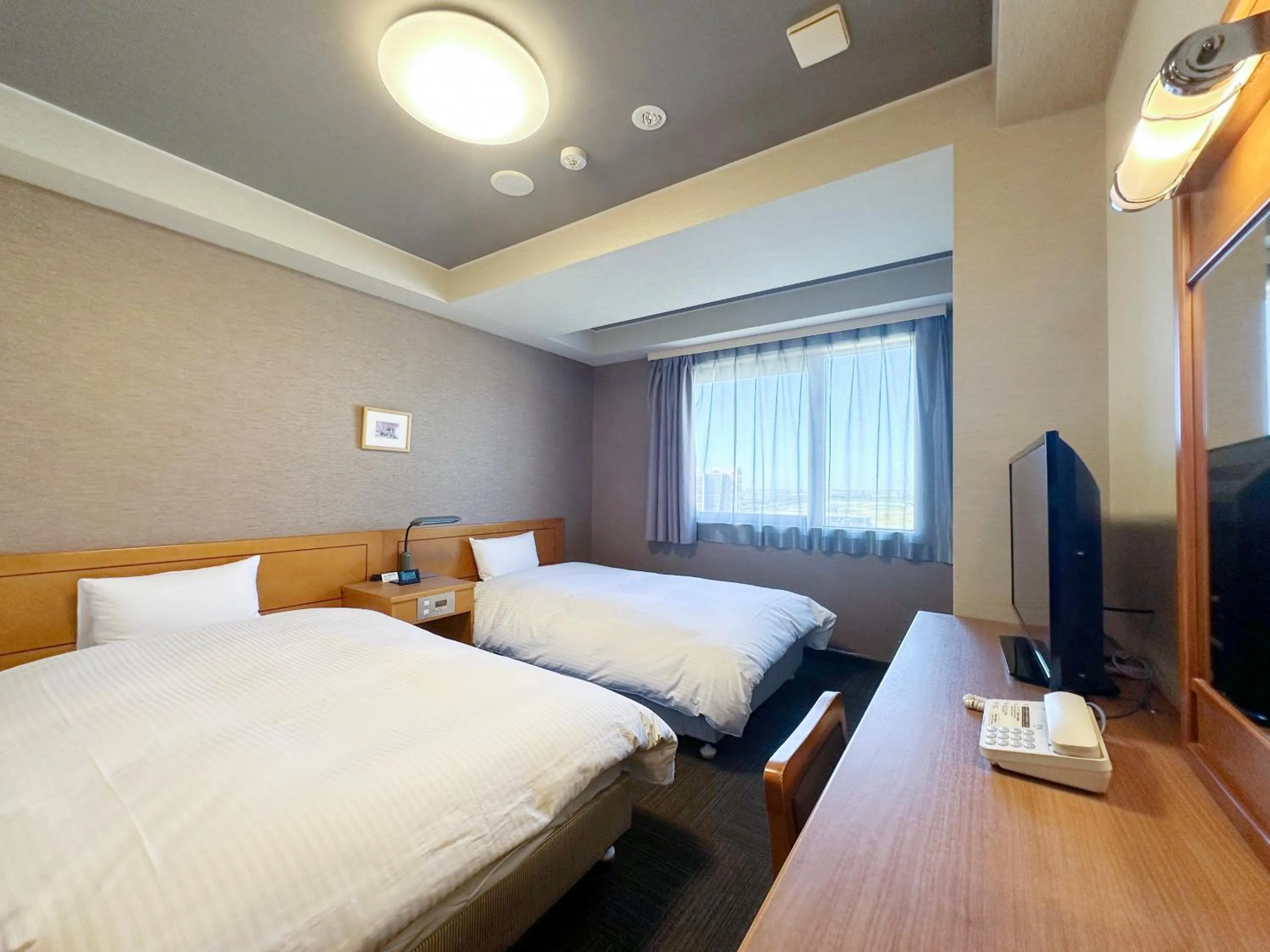 Photo of the whole room, Bed in Hotel Route-Inn Fukui Owada