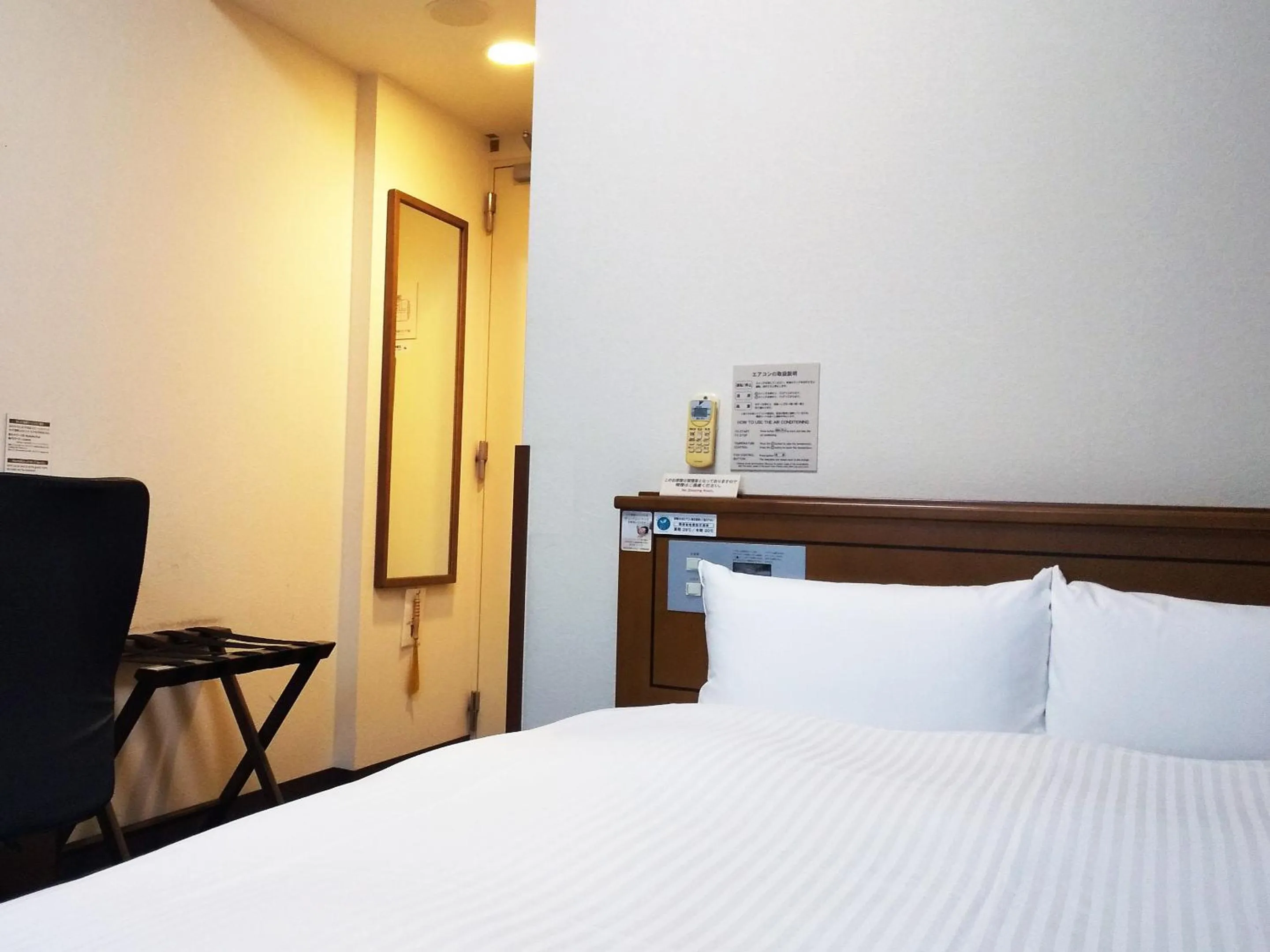 Photo of the whole room, Bed in Hotel Route-Inn Tsuruga Ekimae