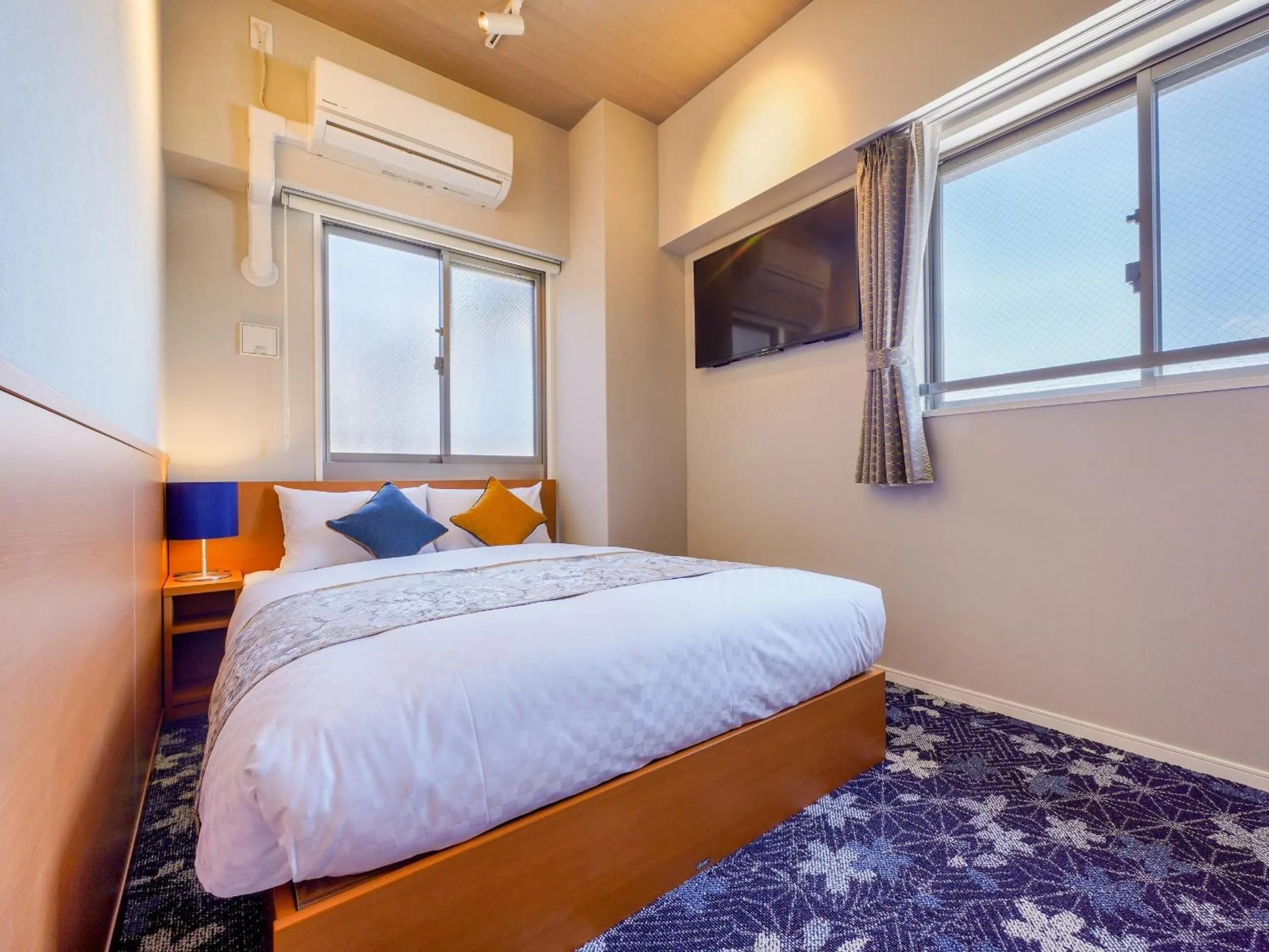 Bed in RESI STAY THE KYOTO