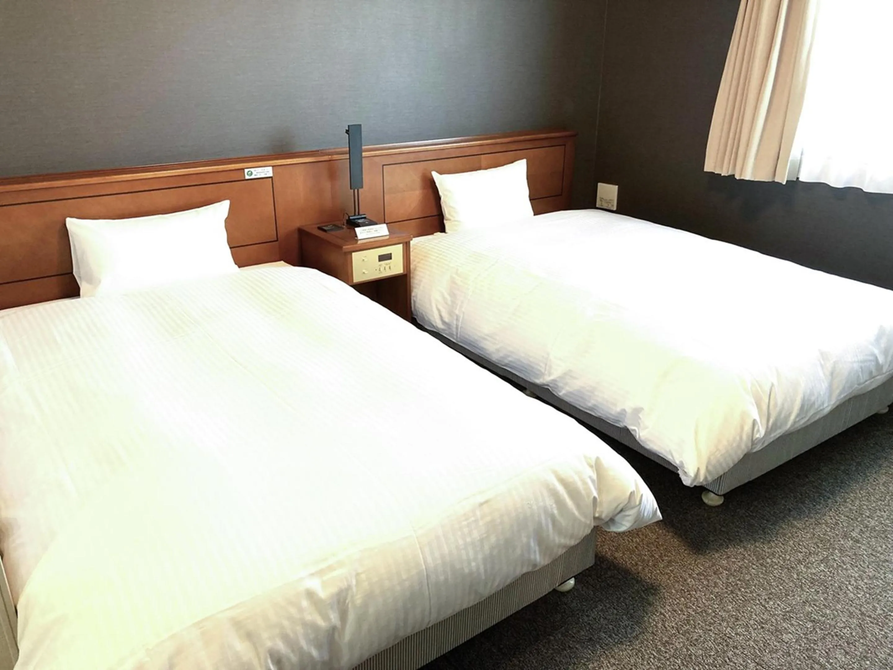Photo of the whole room, Bed in Hotel Route-Inn Mikawa Inter