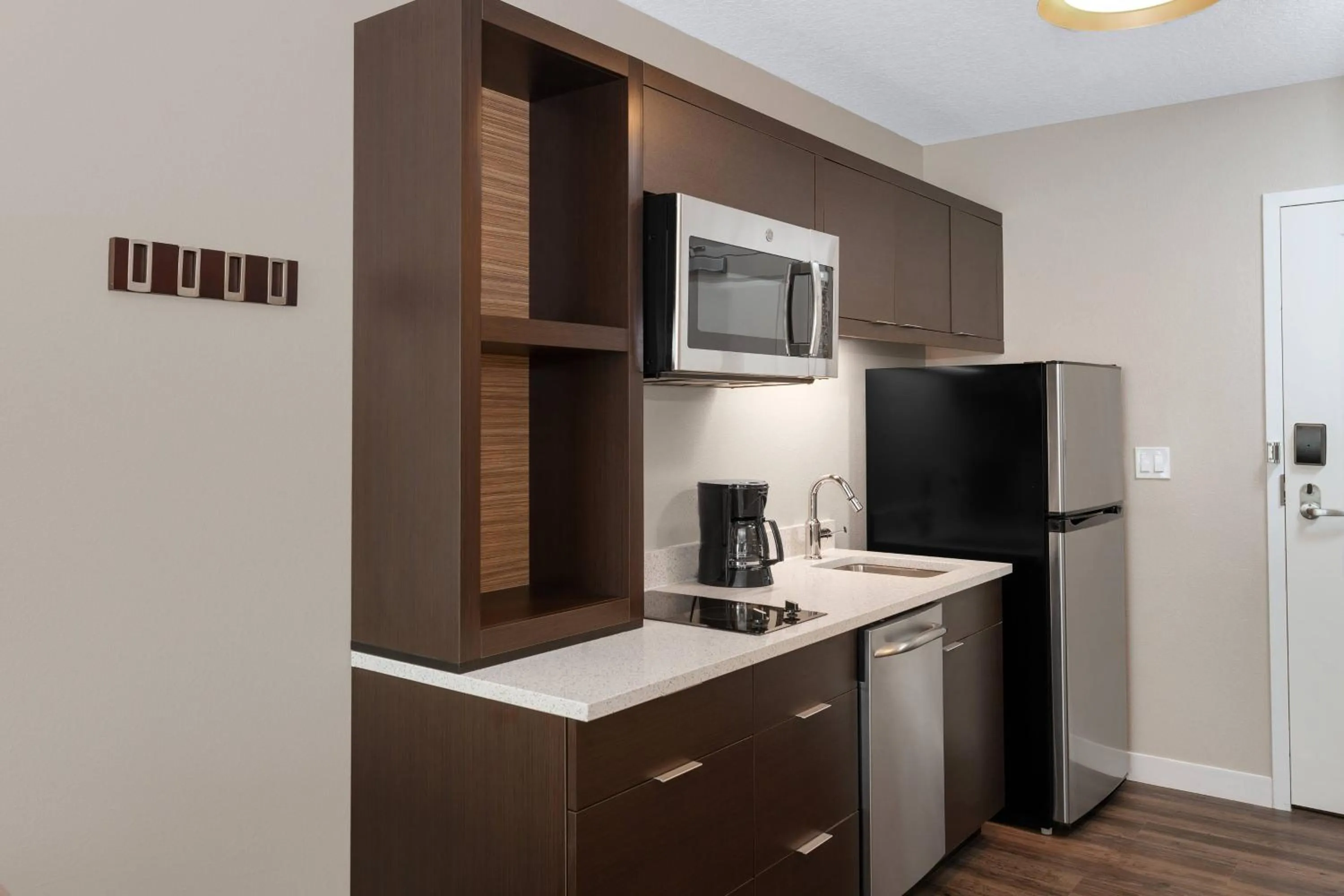 Kitchen or kitchenette in TownePlace Suites by Marriott Titusville Kennedy Space Center