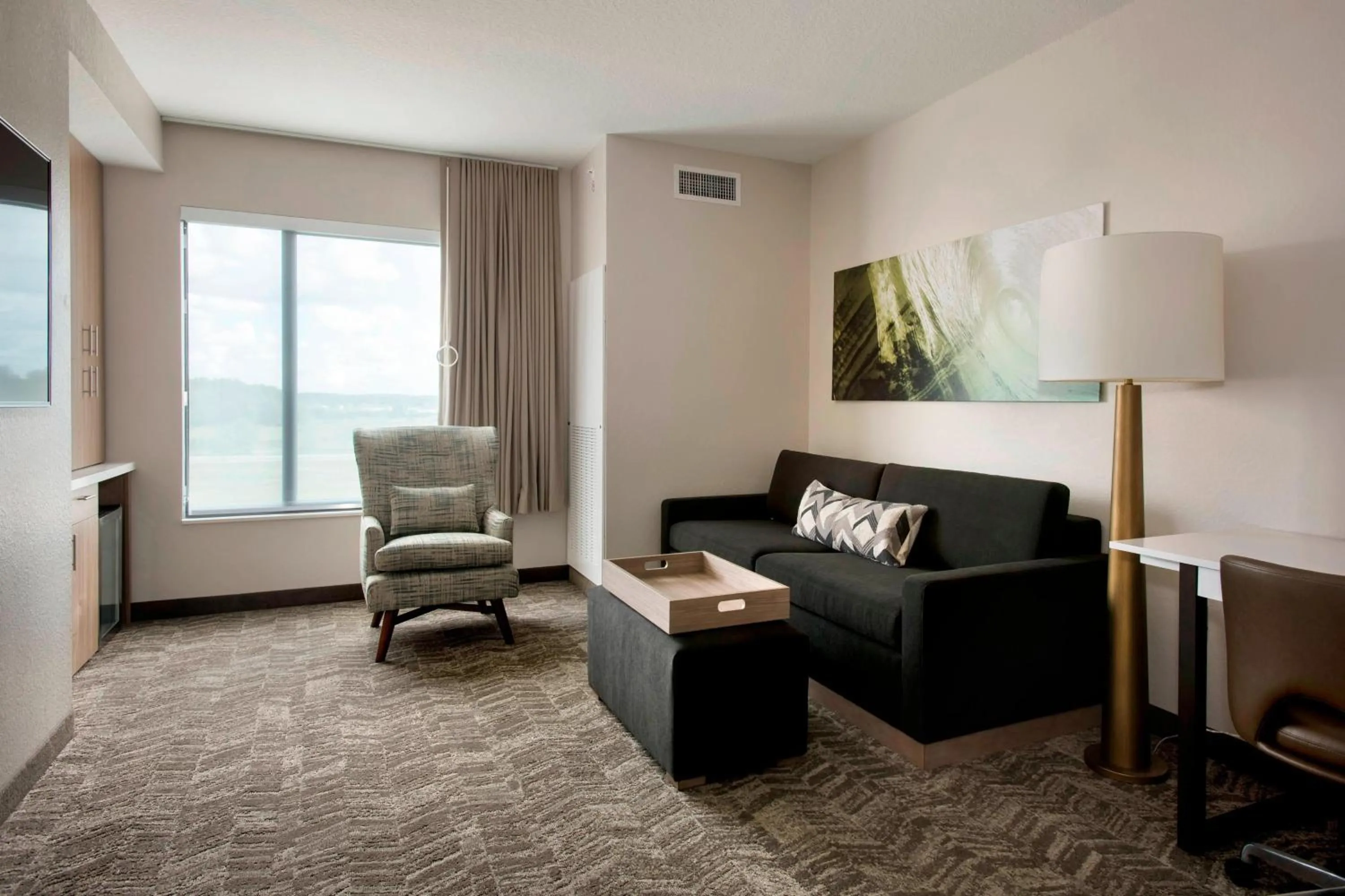Living room in SpringHill Suites by Marriott Tampa Suncoast Parkway