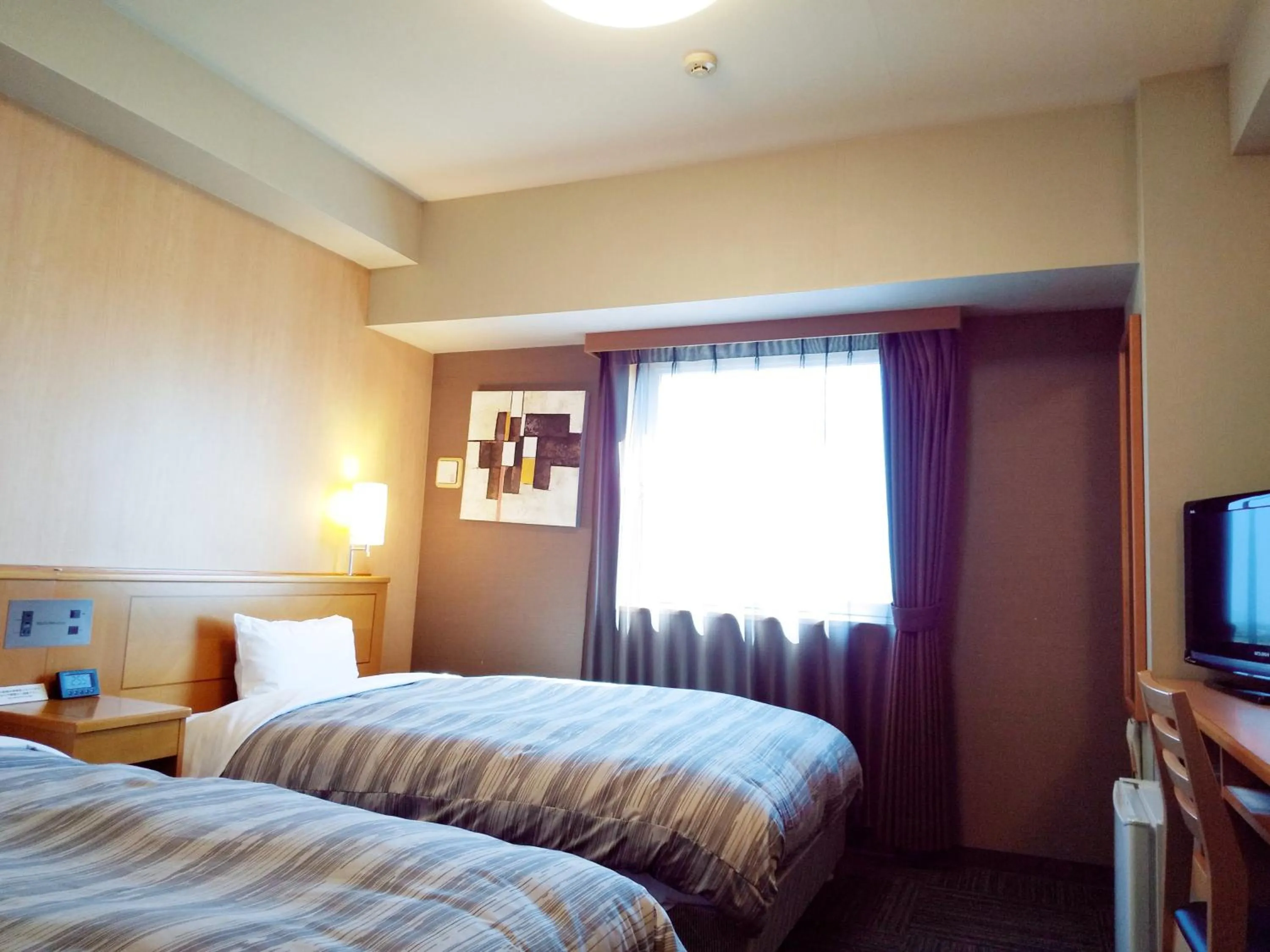 Photo of the whole room, Bed in Hotel Route-Inn Hamamatsu Nishi Inter