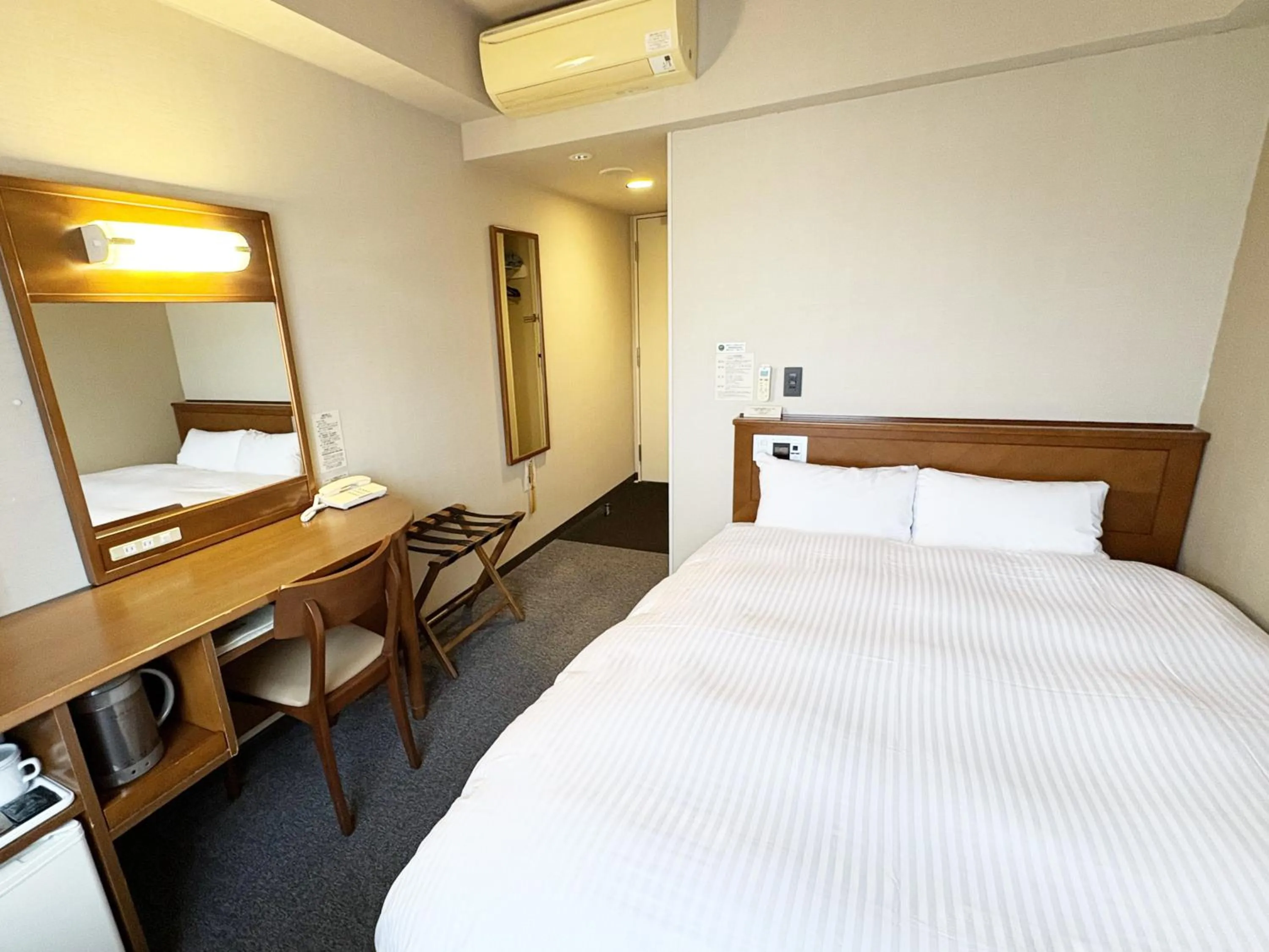 Photo of the whole room, Bed in Hotel Route-Inn Iwaki Ekimae