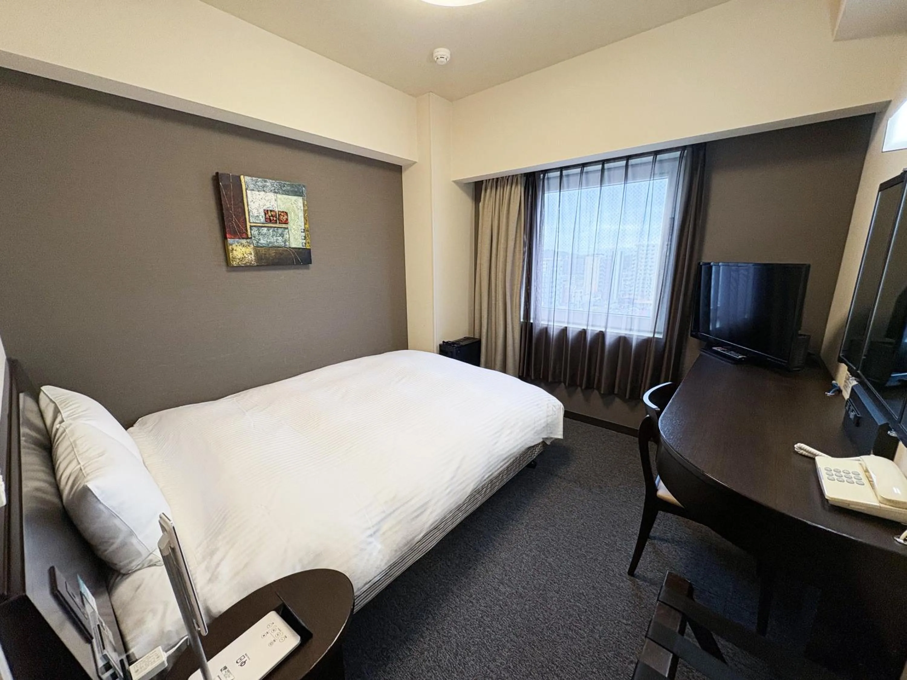 Photo of the whole room, Bed in Hotel Route-Inn Iwaki Ekimae