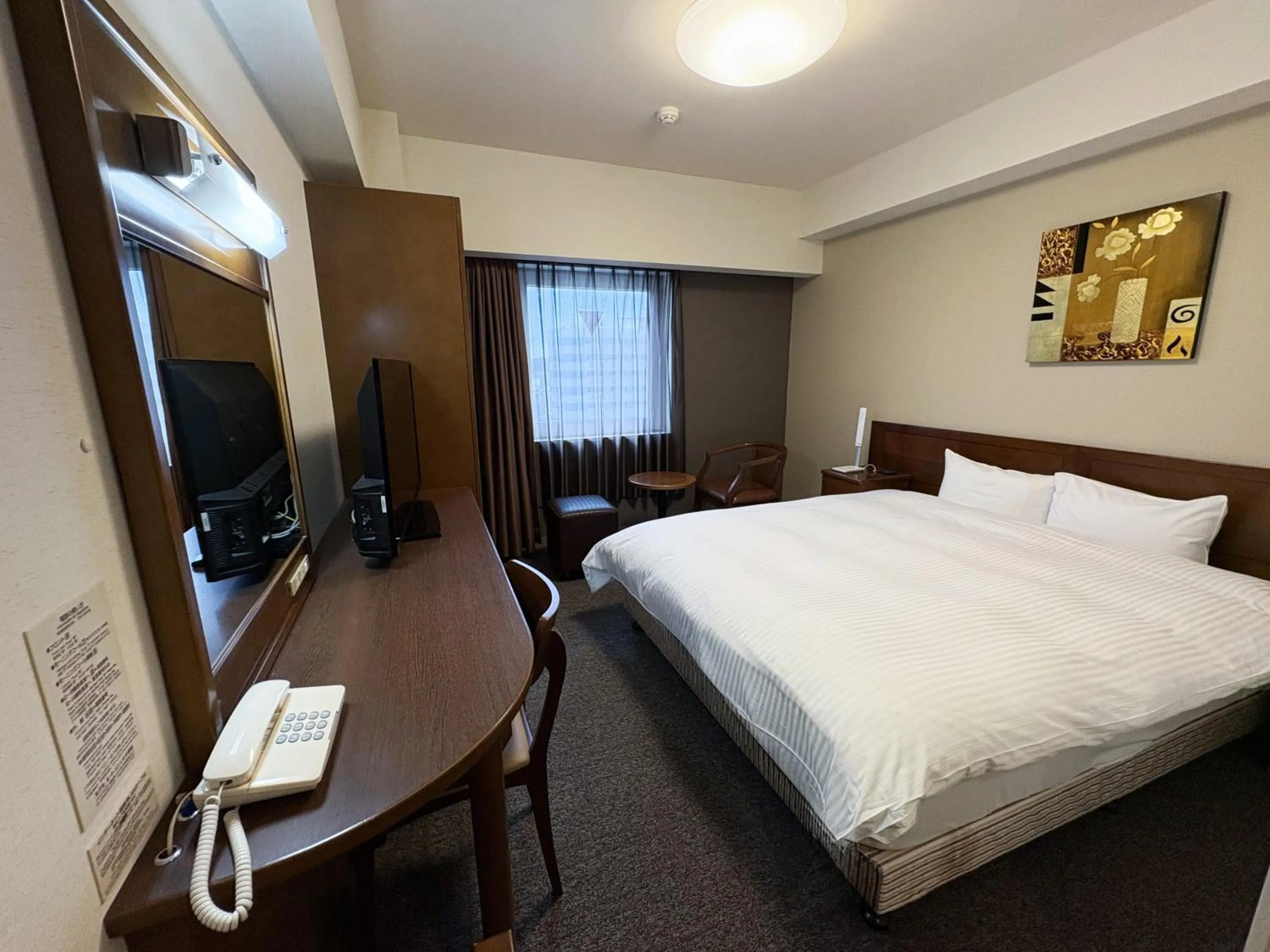 Photo of the whole room, Bed in Hotel Route-Inn Iwaki Ekimae