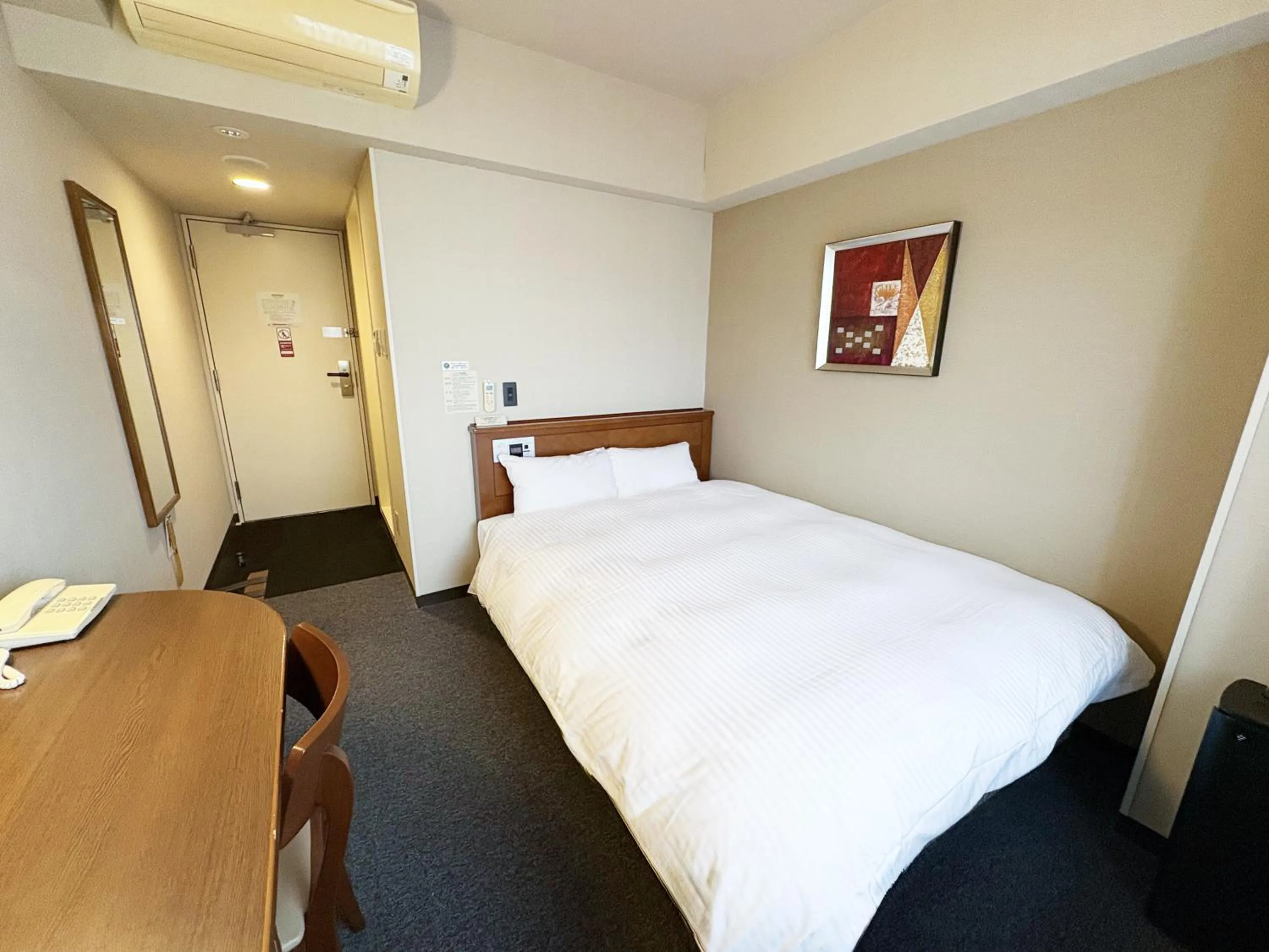 Photo of the whole room, Bed in Hotel Route-Inn Iwaki Ekimae