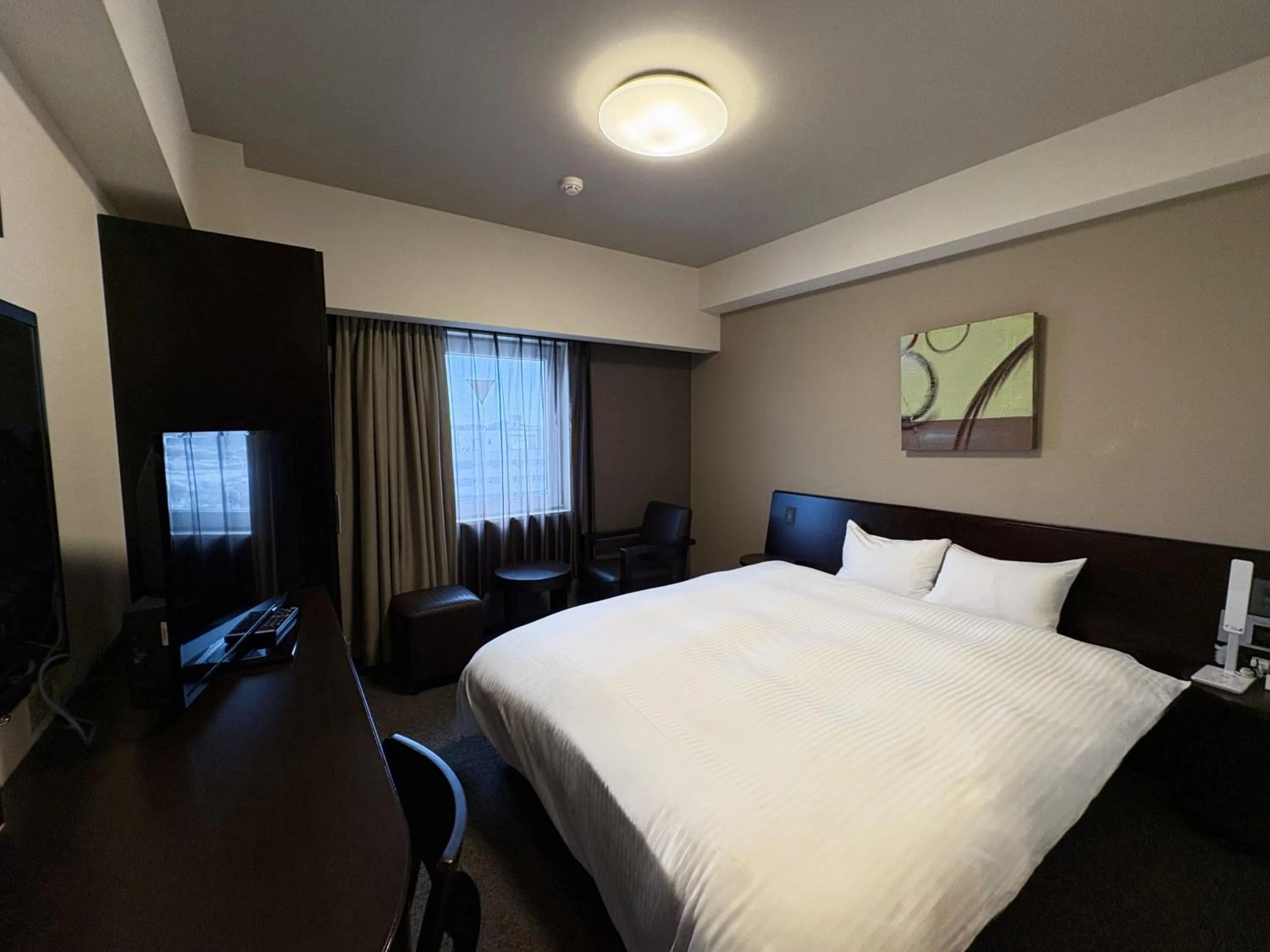 Photo of the whole room, Bed in Hotel Route-Inn Iwaki Ekimae