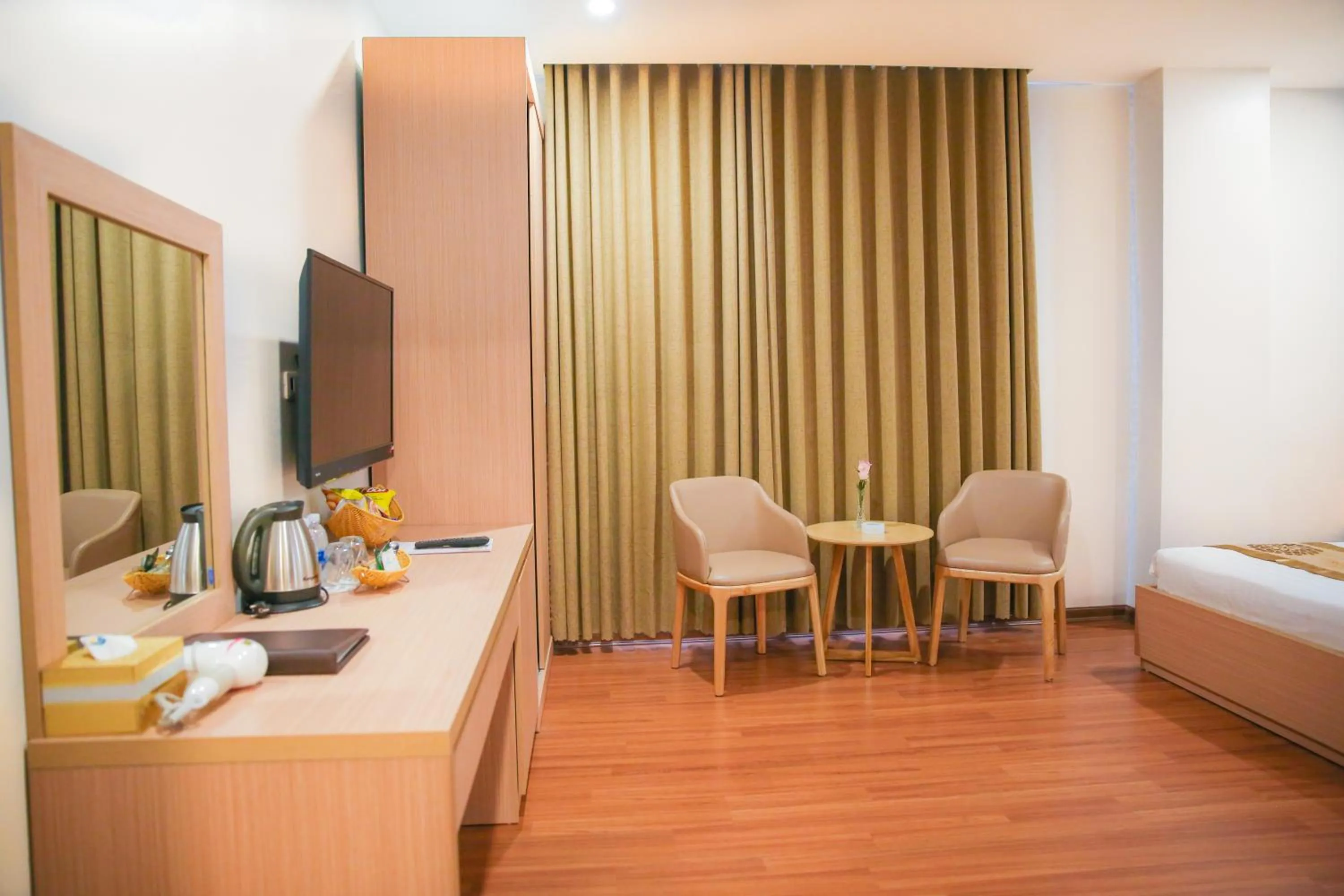 Seating area, Bed in Long Anh Hotel