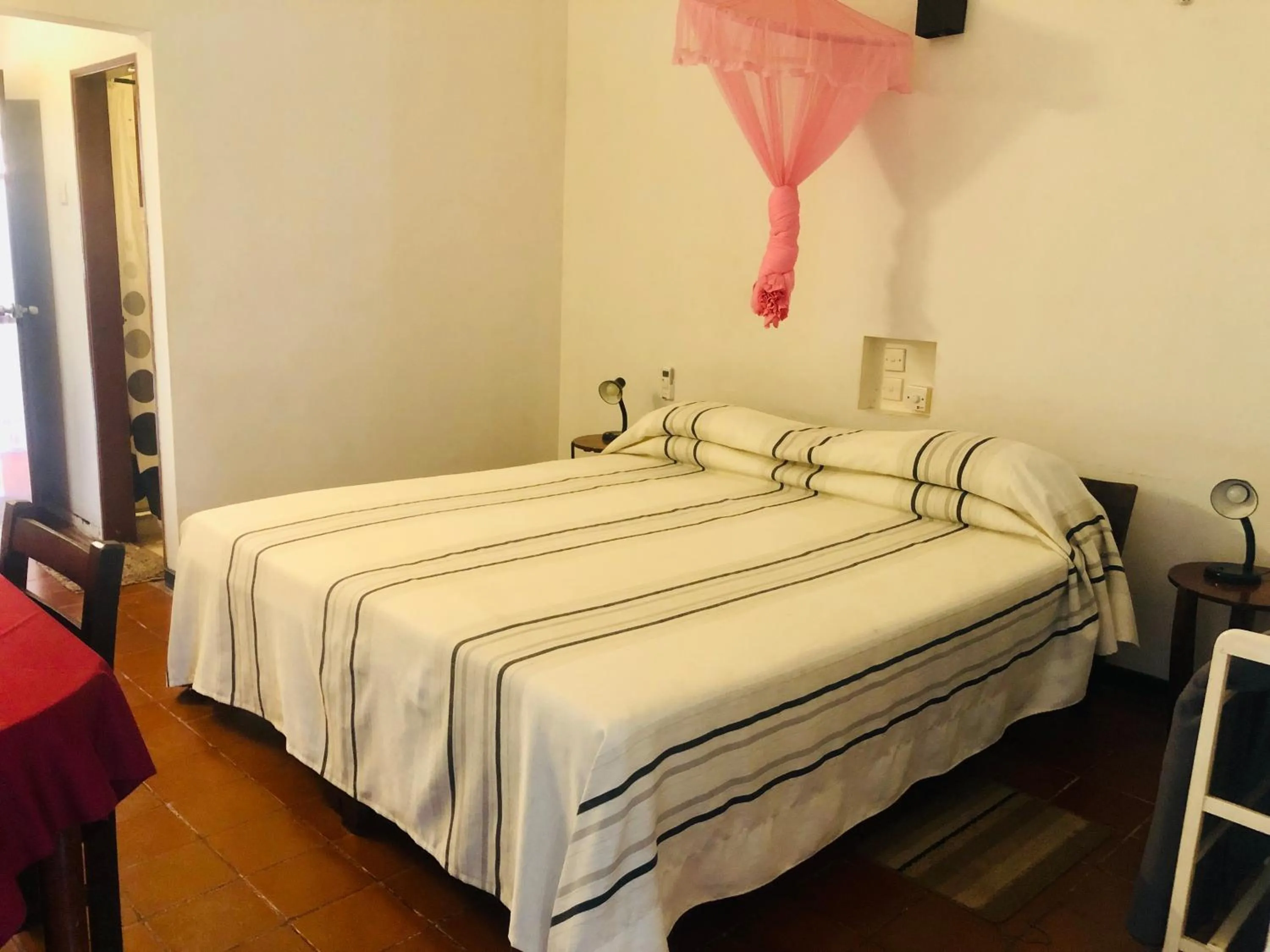 Bed in Hotel Hemadan