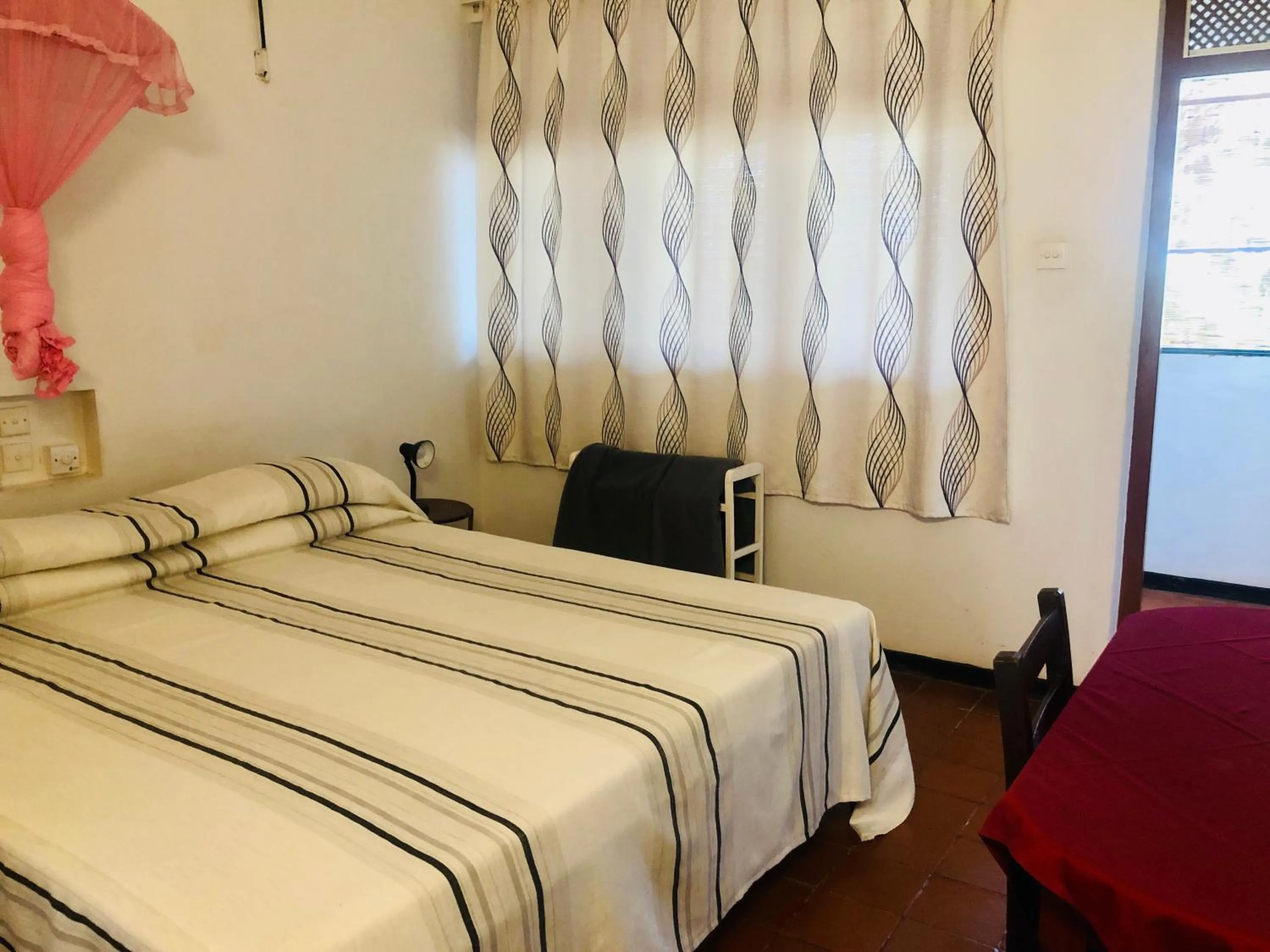 Bed in Hotel Hemadan