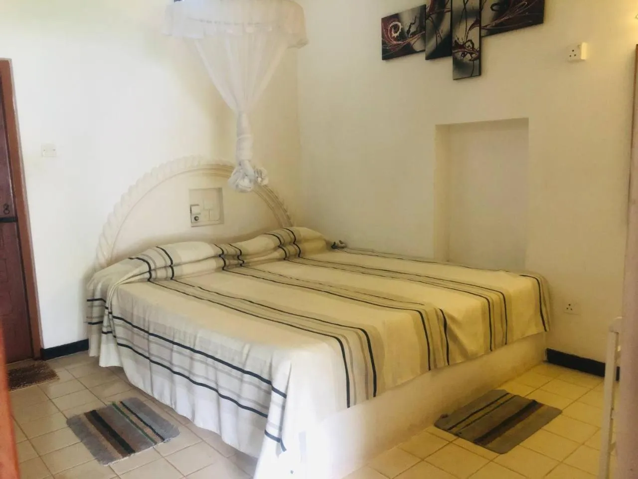 Bed in Hotel Hemadan