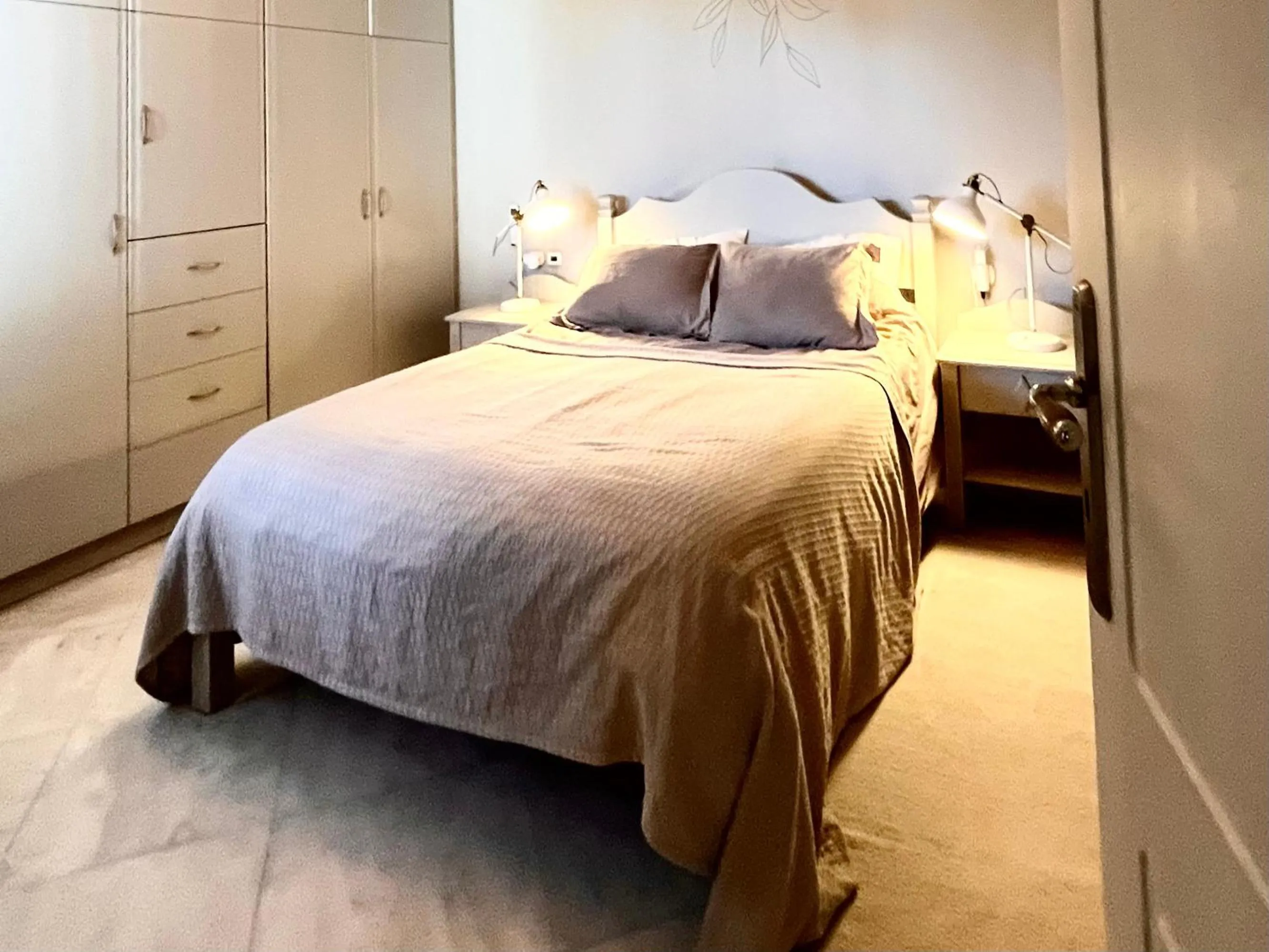 Bed in Pantheon Apartments & Studios