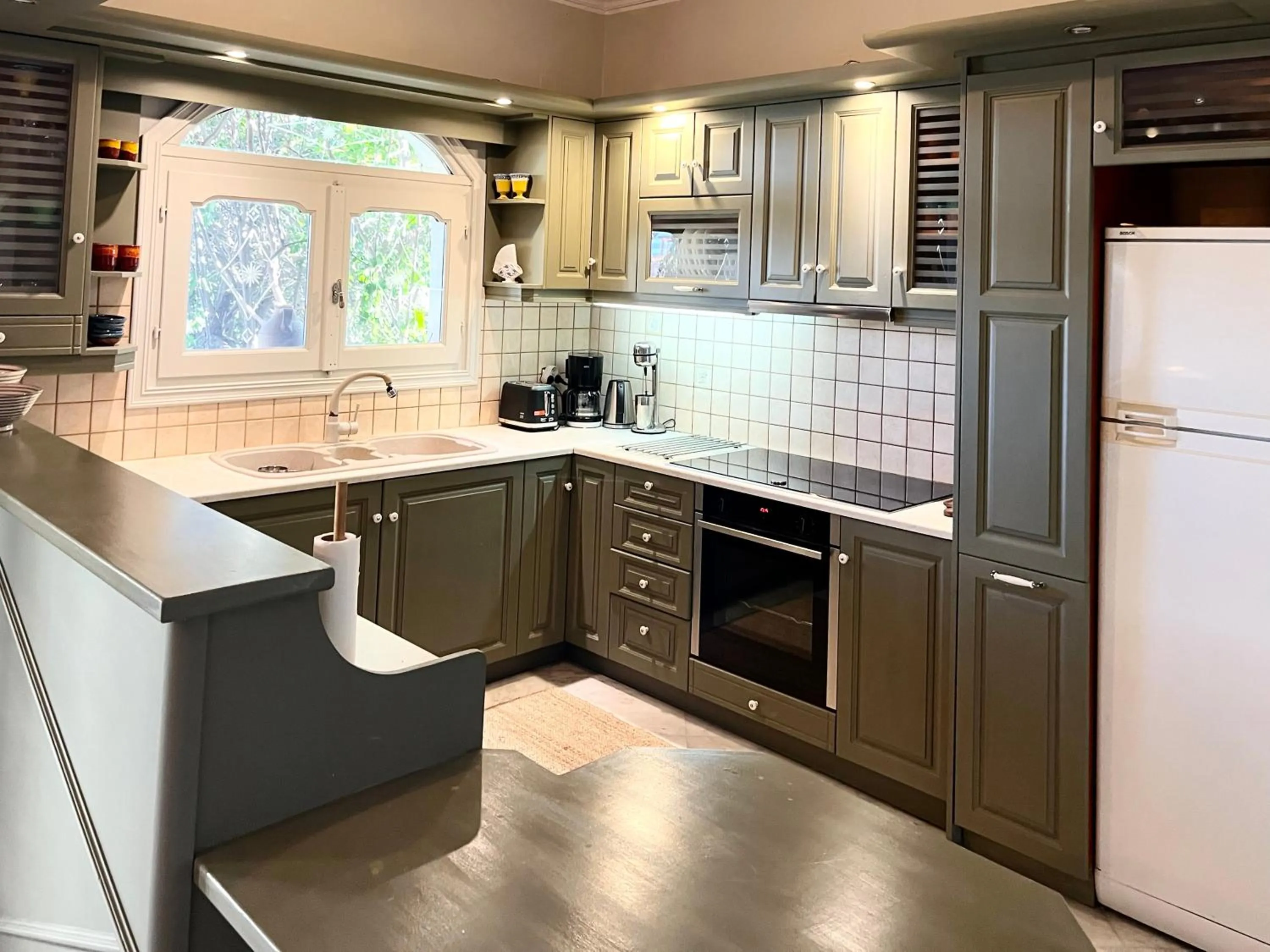 kitchen in Pantheon Apartments & Studios