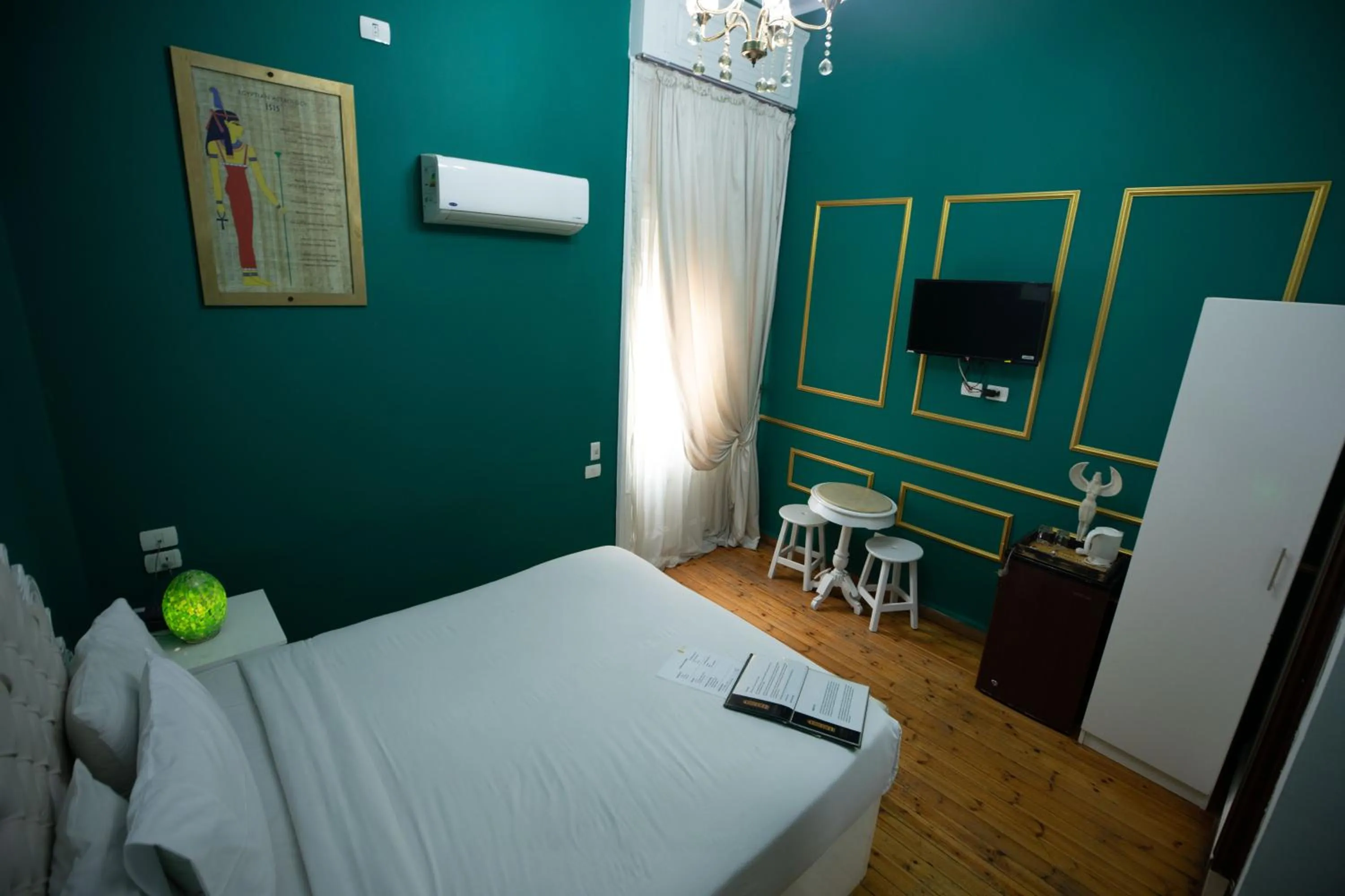 Bed in Tahrir Plaza Suites - Museum View