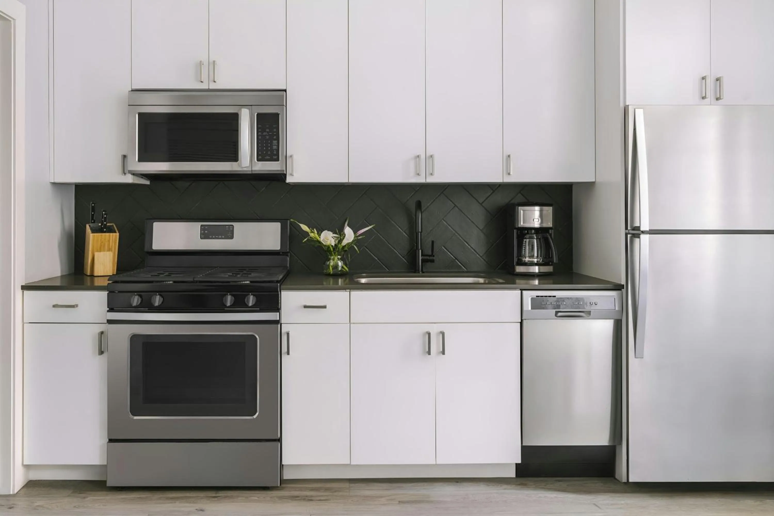 Kitchen or kitchenette in Sonder by Marriott Bonvoy The Plymouth Apartments Loop