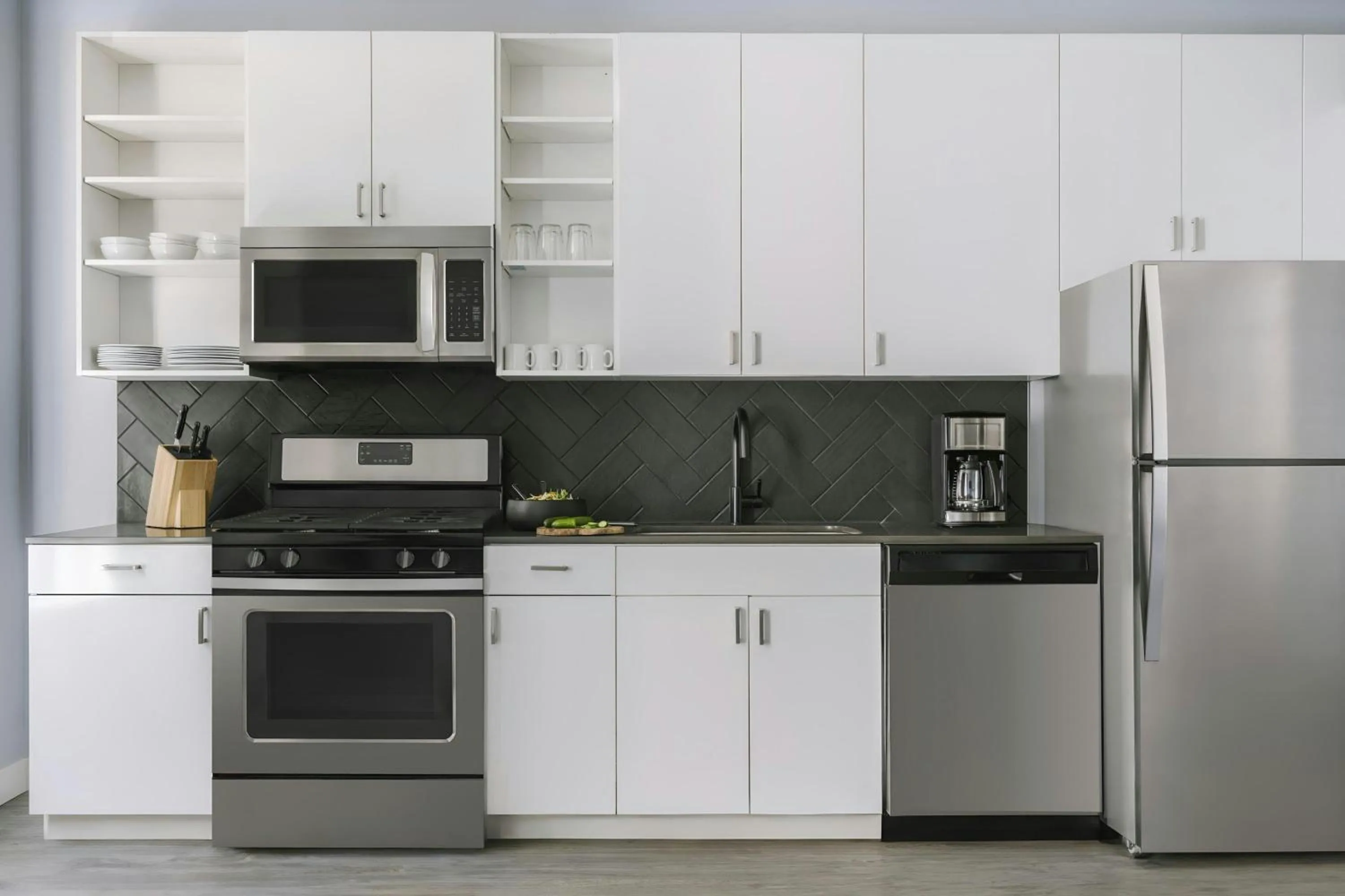 Kitchen or kitchenette in Sonder by Marriott Bonvoy The Plymouth Apartments Loop