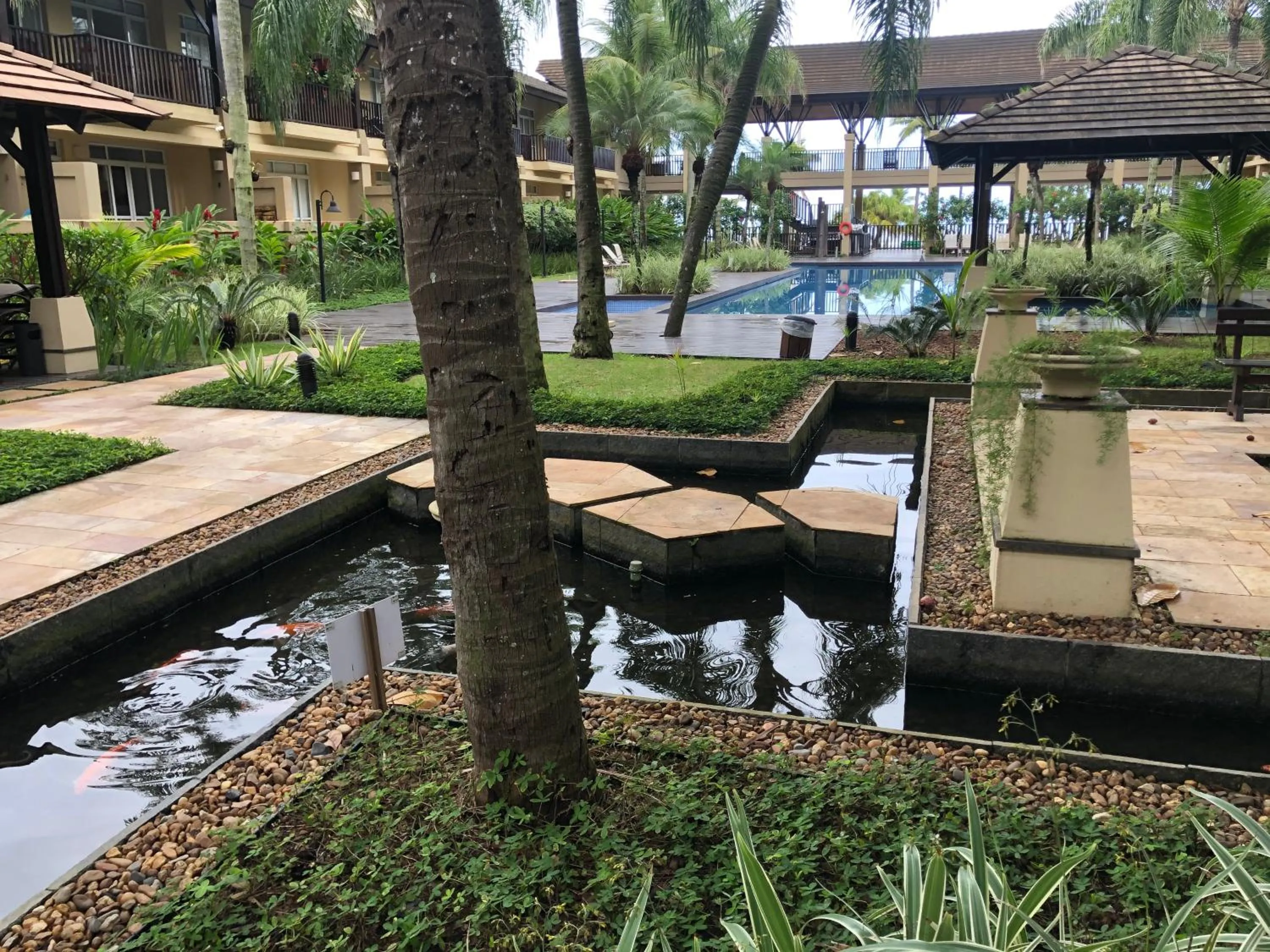 Garden view in Residências Garcez - Pantai Enseada - Vista Mar