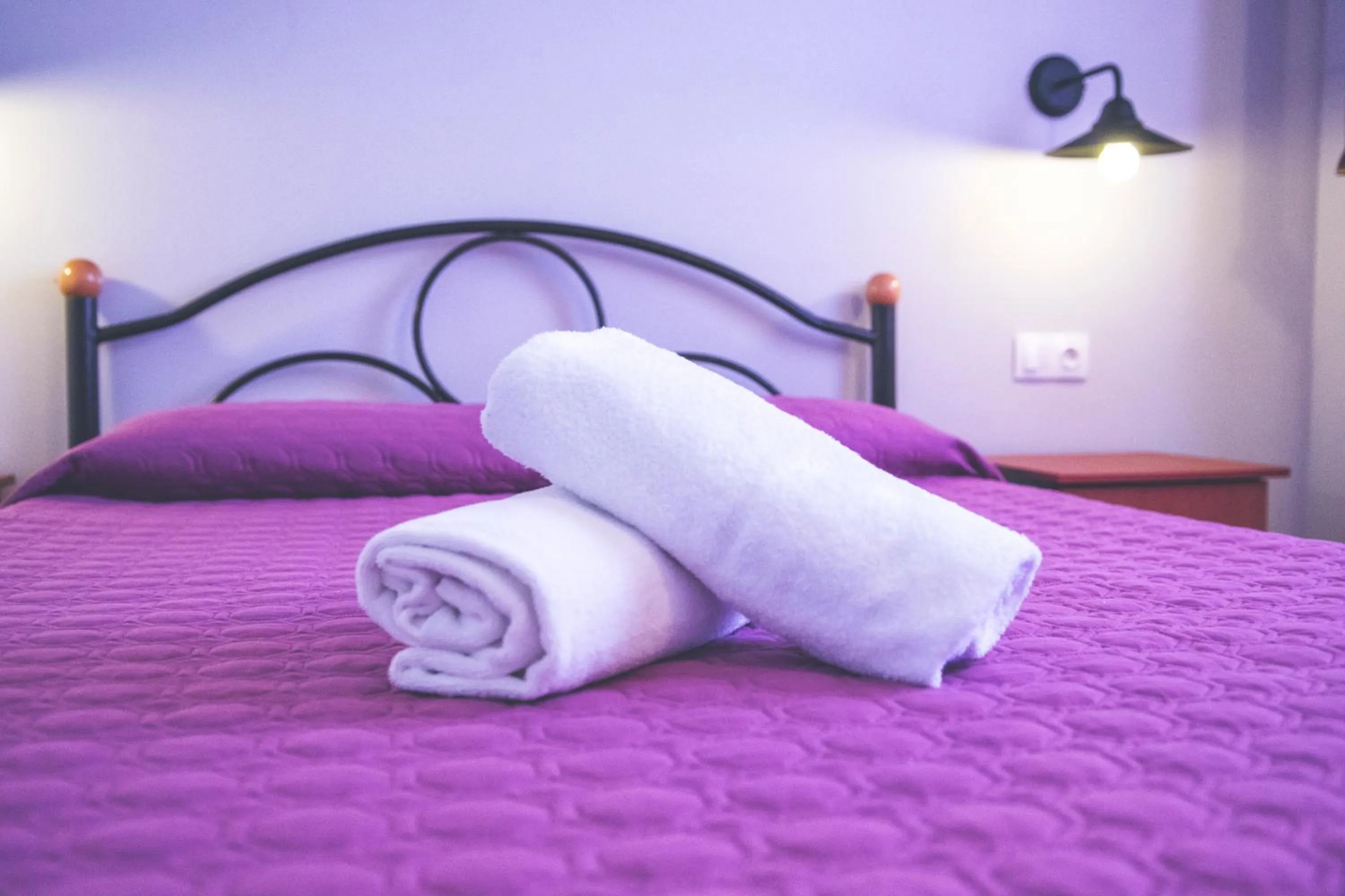 Bed in The Palm Garden - Idyllic Pool Apartments in a Green Oasis