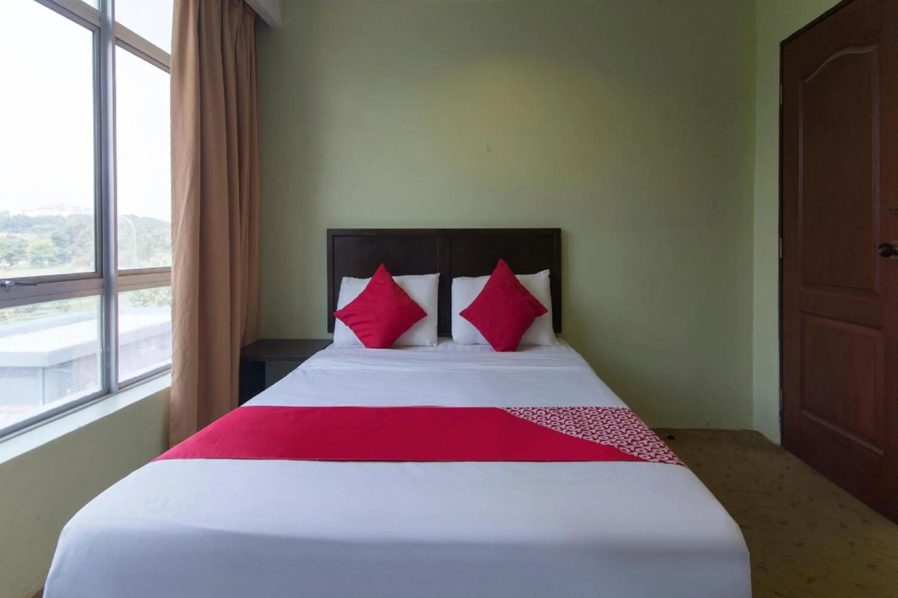 Bedroom in Amani Hotel