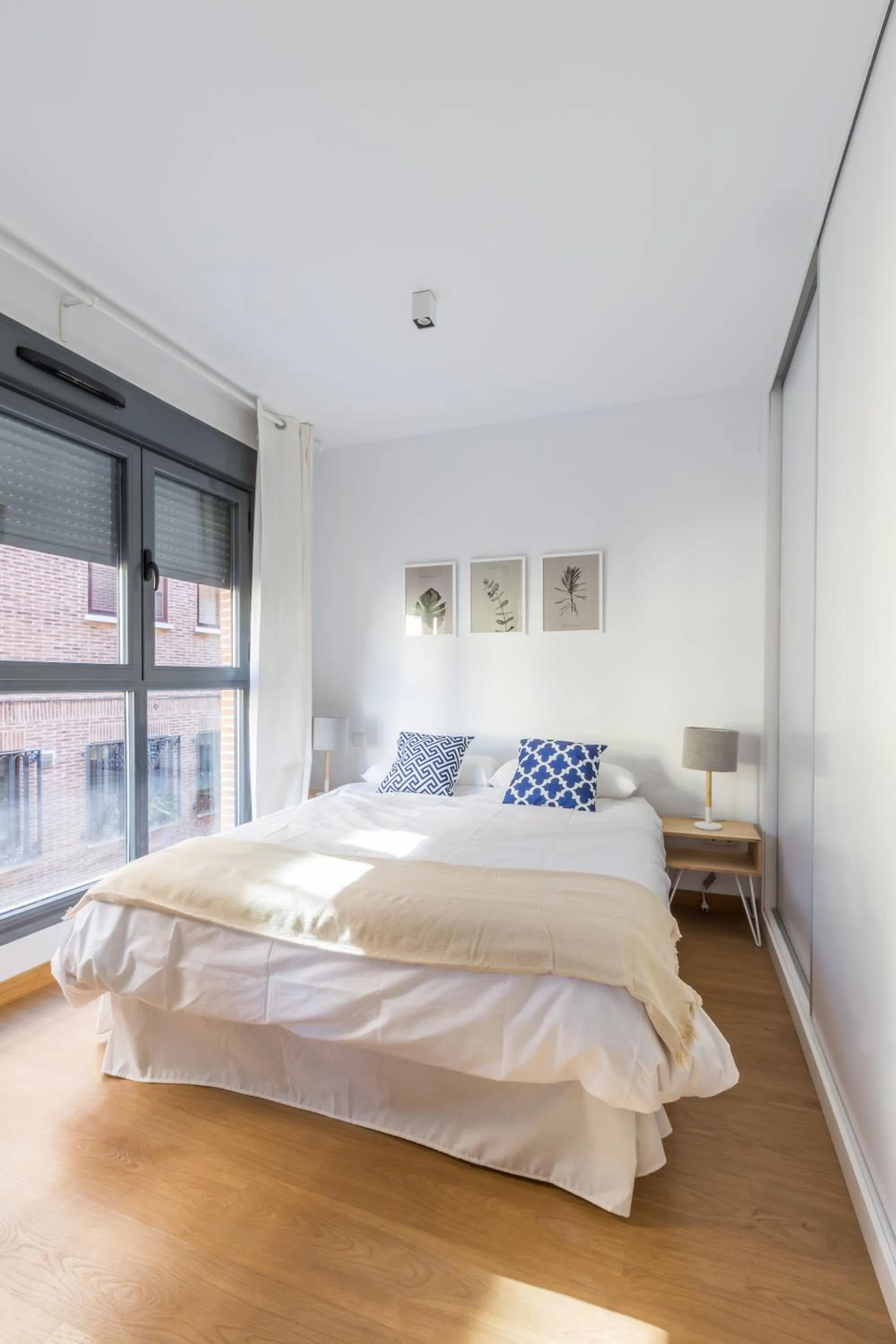 Bed in Horoko Apartments by gaiarooms