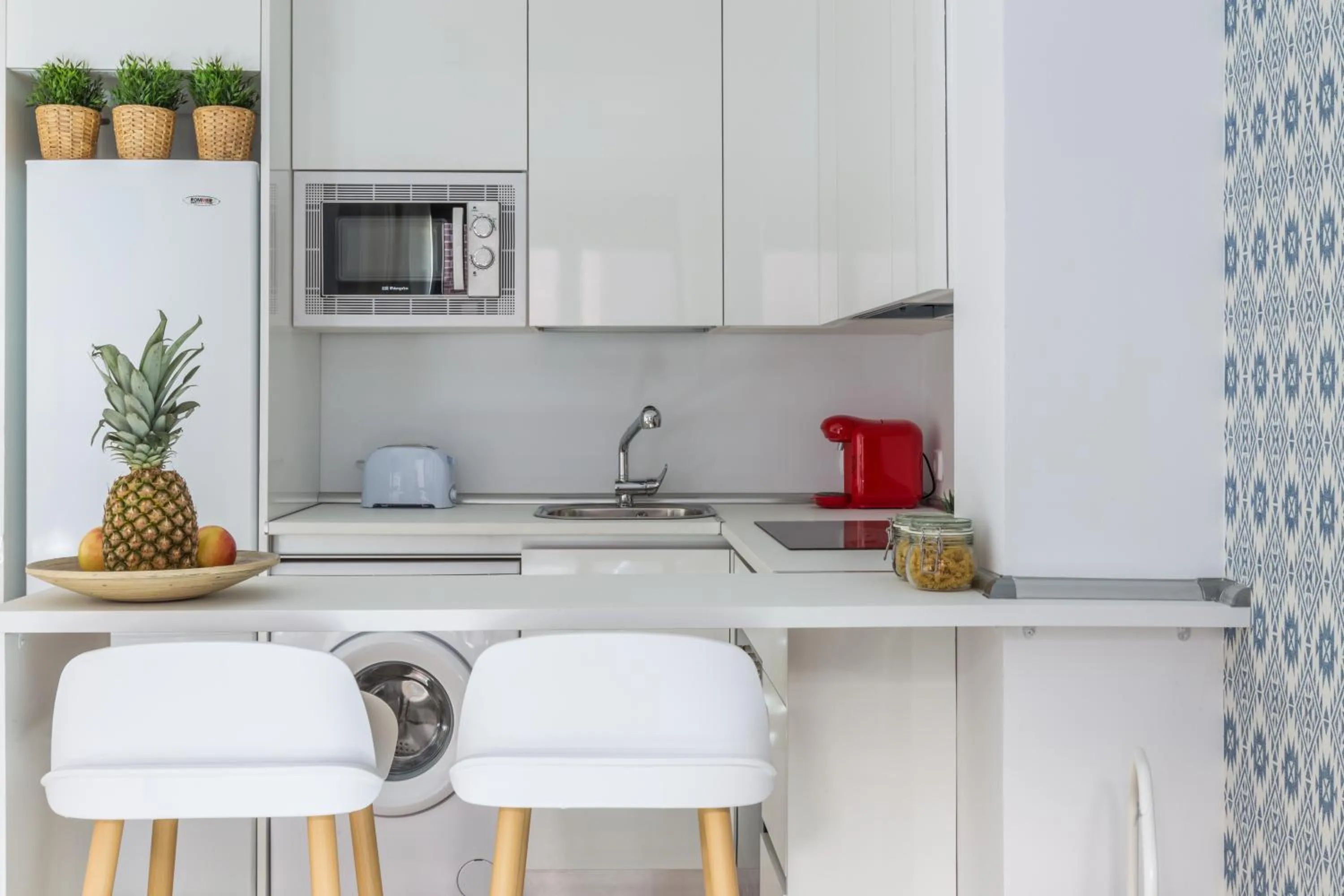 Kitchen or kitchenette in Horoko Apartments by gaiarooms