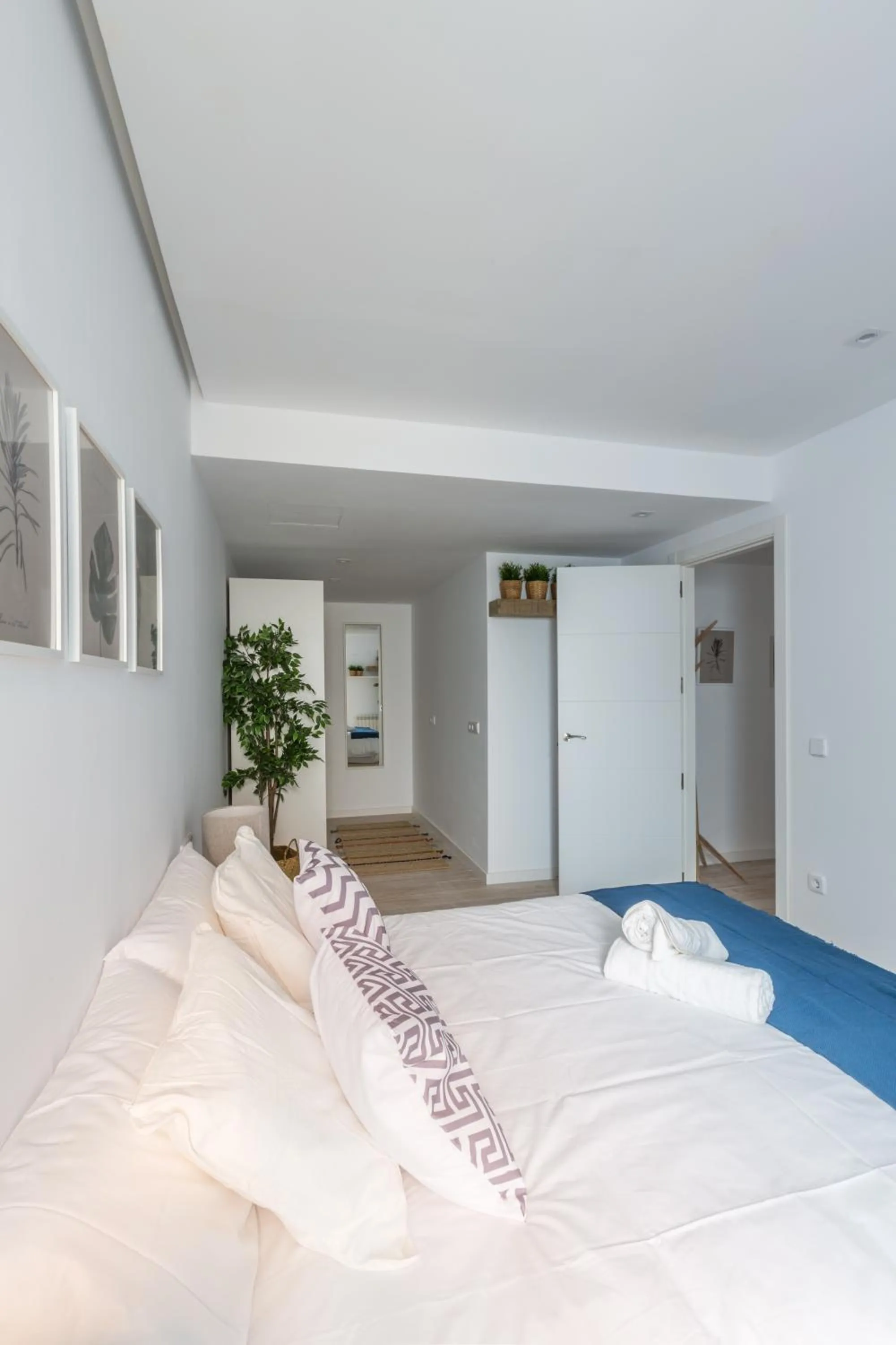 Bed in Horoko Apartments by gaiarooms