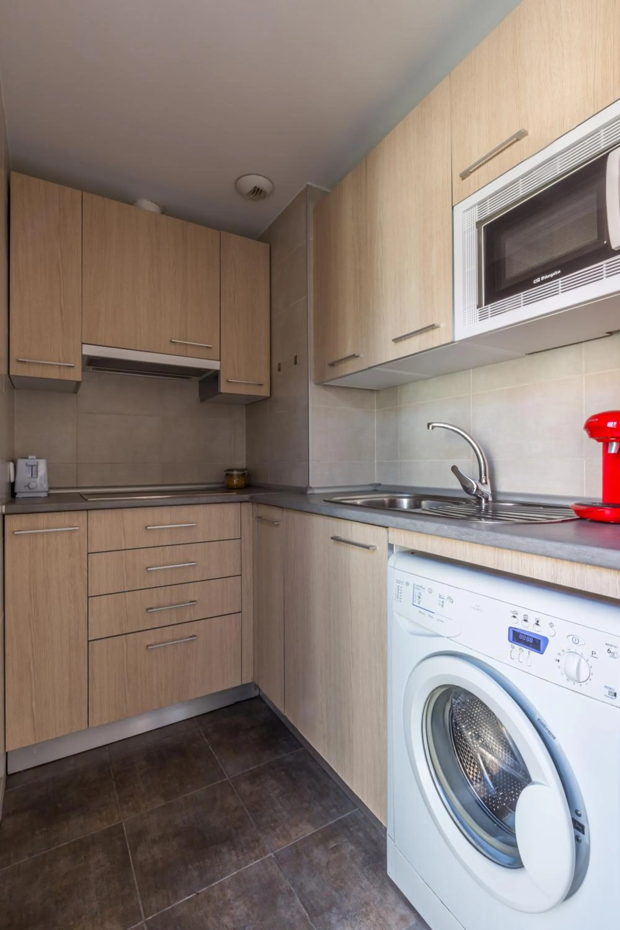 Kitchen or kitchenette in Horoko Apartments by gaiarooms