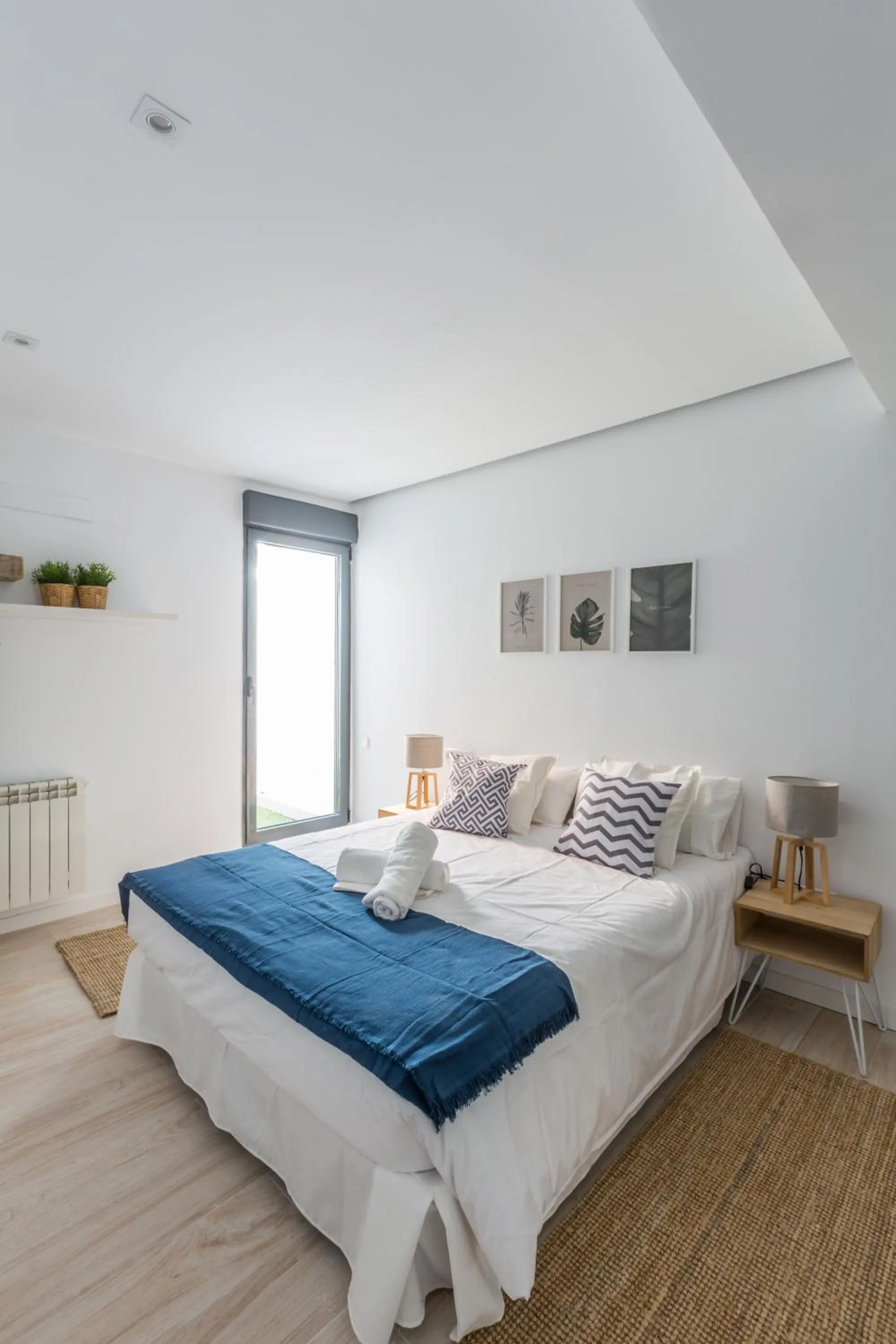 Bed in Horoko Apartments by gaiarooms