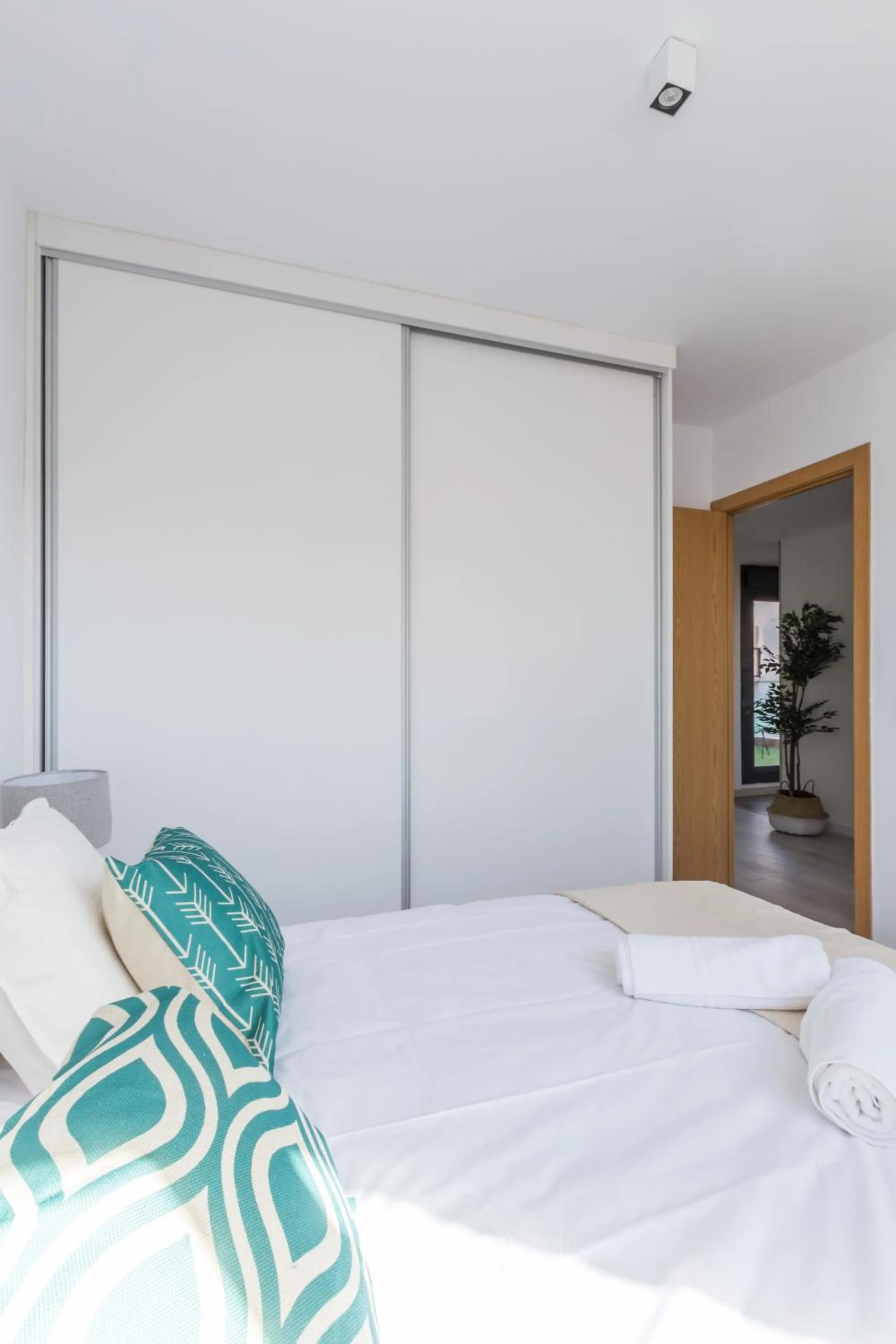 Bed in Horoko Apartments by gaiarooms