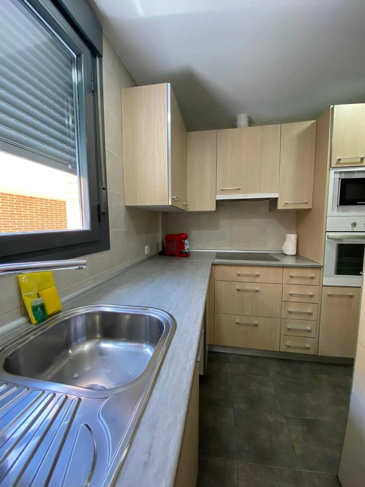 Kitchen or kitchenette in Horoko Apartments by gaiarooms