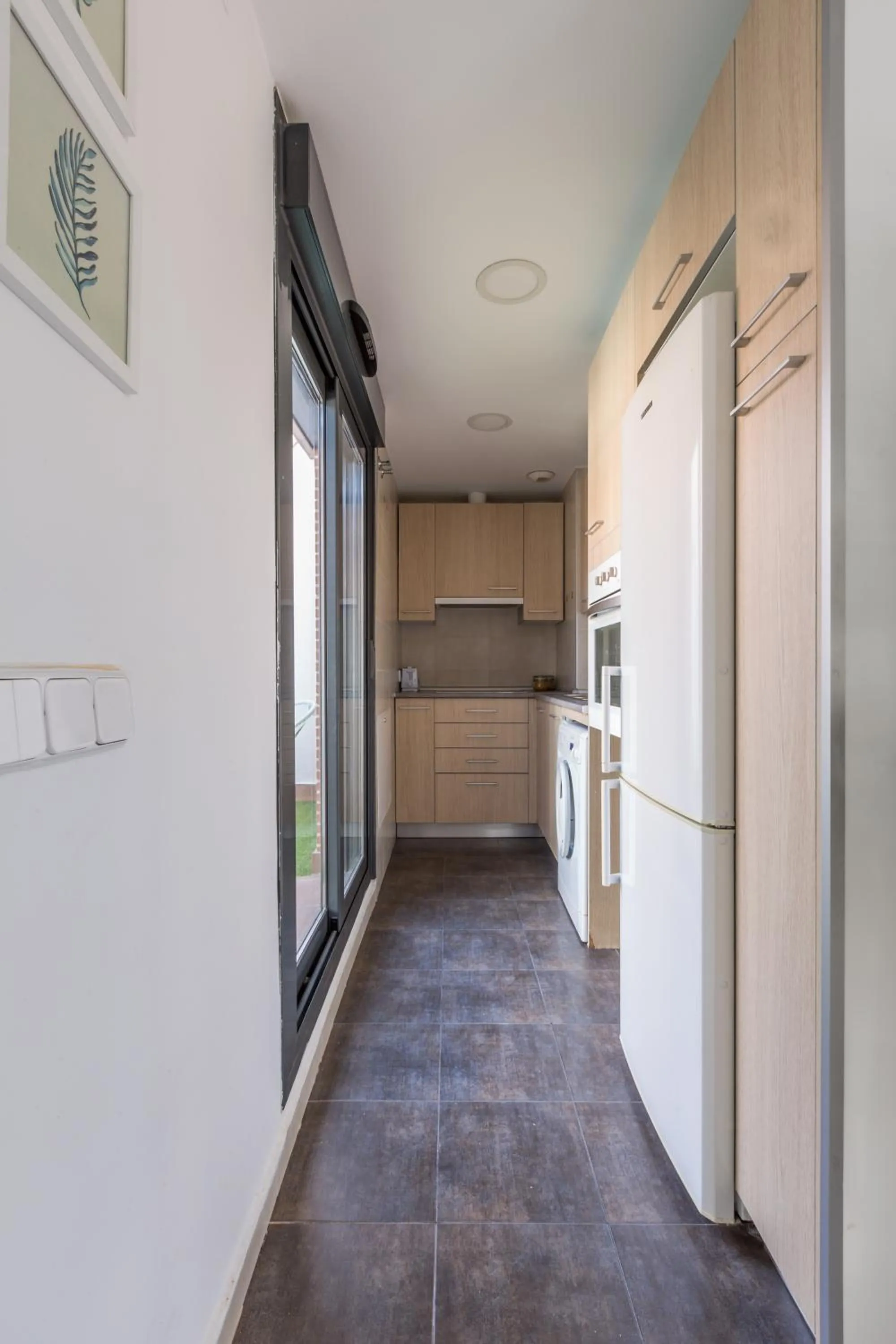 Kitchen or kitchenette in Horoko Apartments by gaiarooms