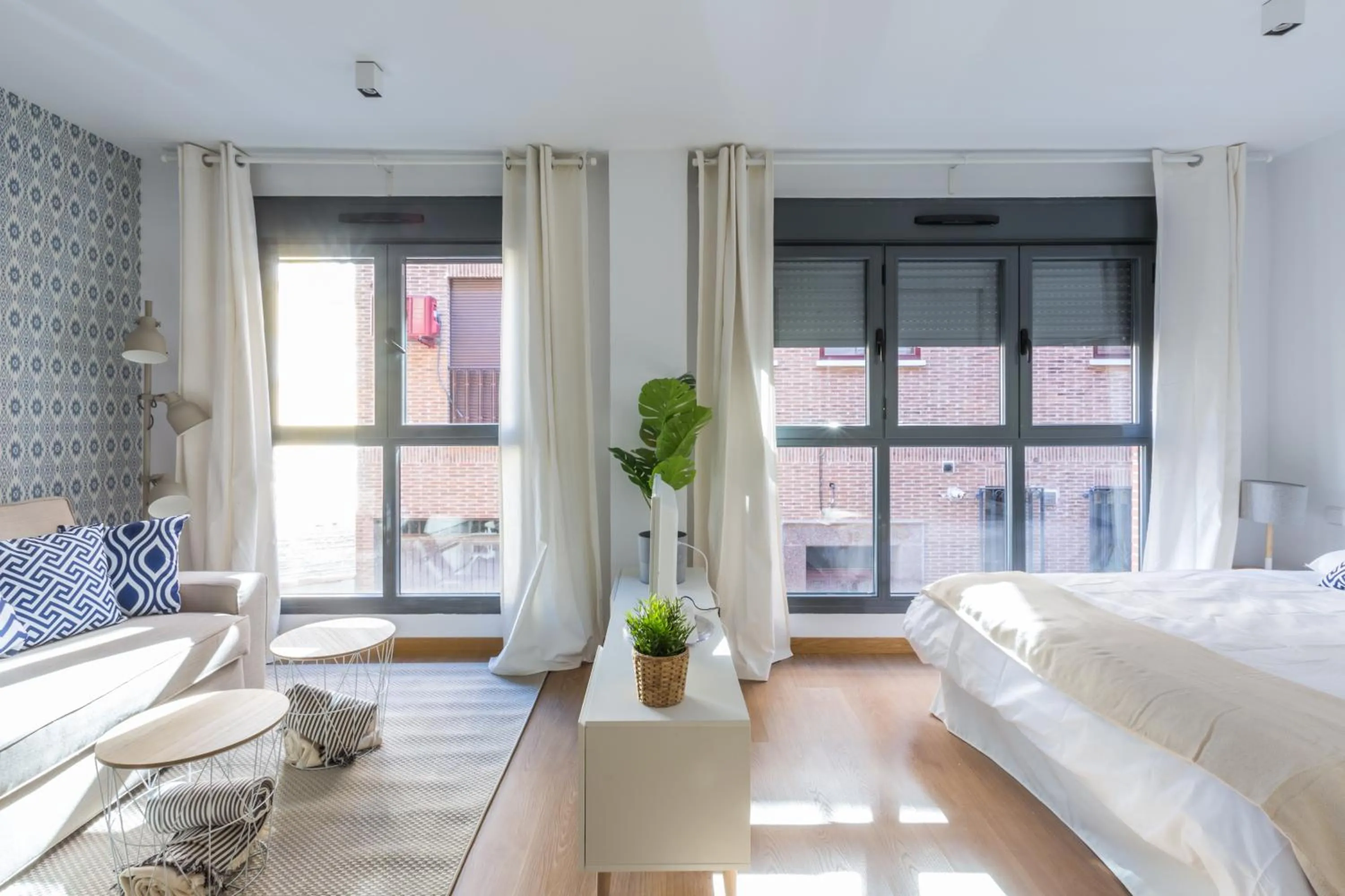 Bed in Horoko Apartments by gaiarooms