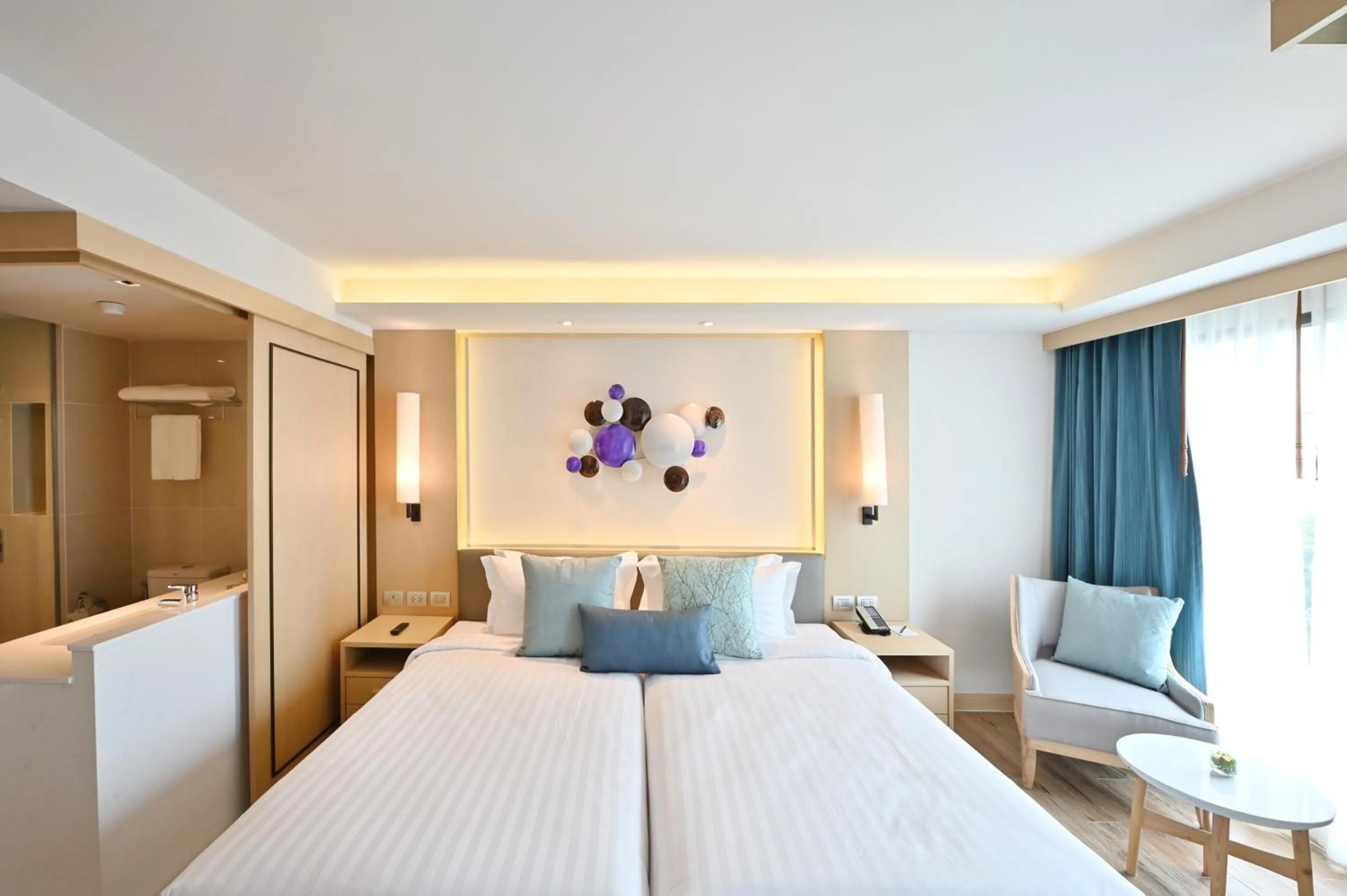 Bed in M Pattaya Hotel - SHA Extra Plus