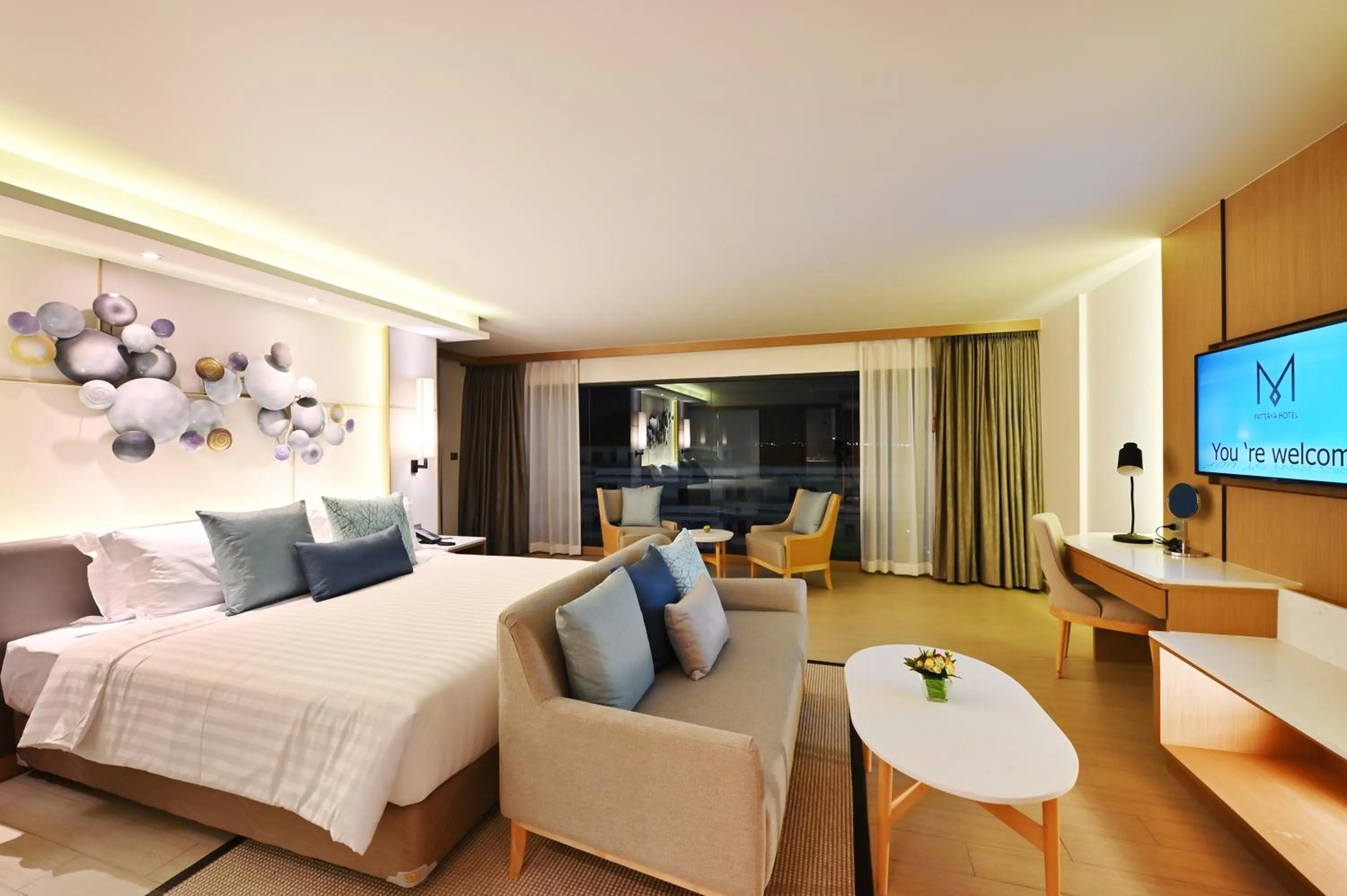 Bed in M Pattaya Hotel - SHA Extra Plus