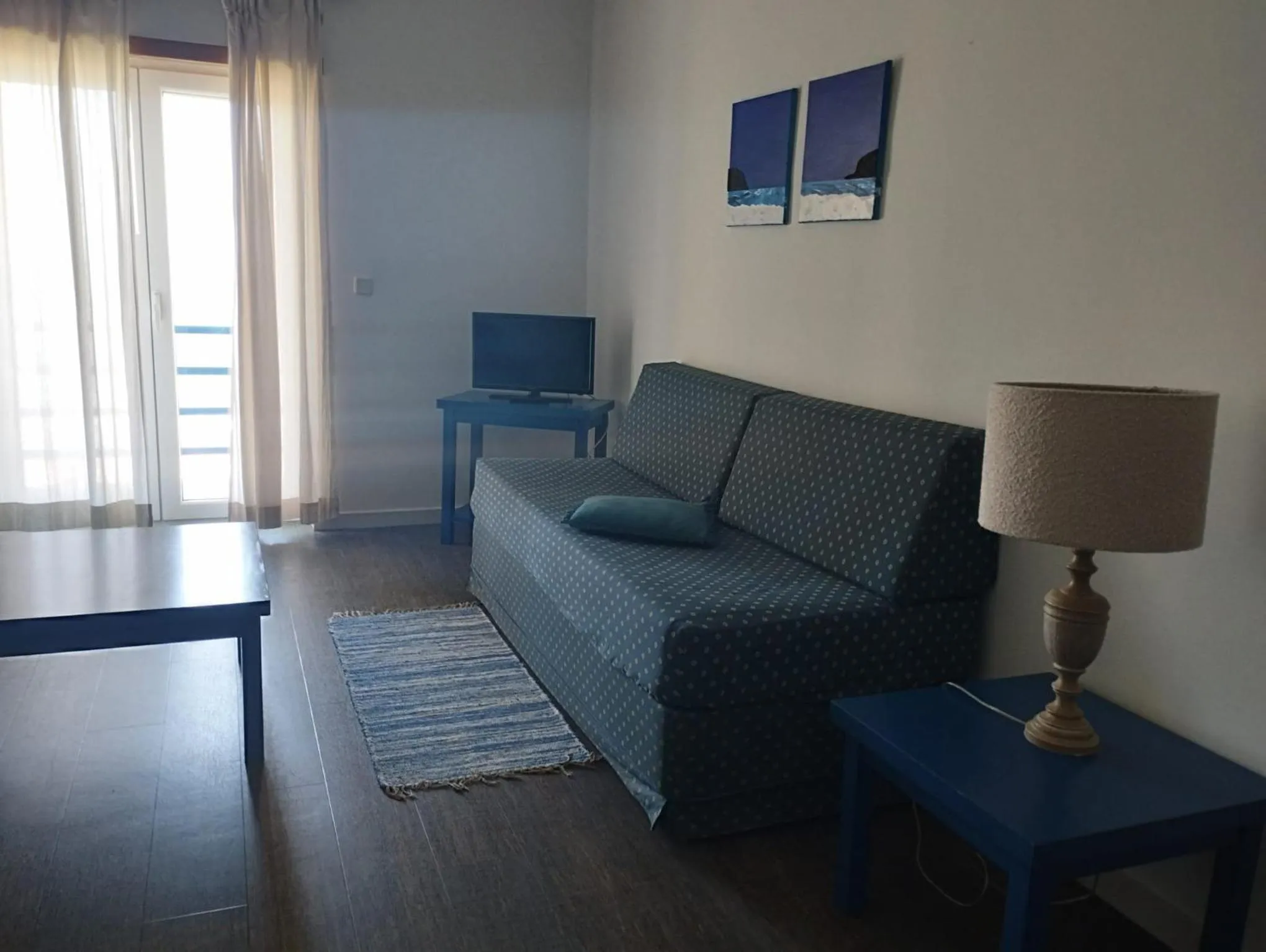 Communal lounge/ TV room in Hotel Apartamento Praia Azul