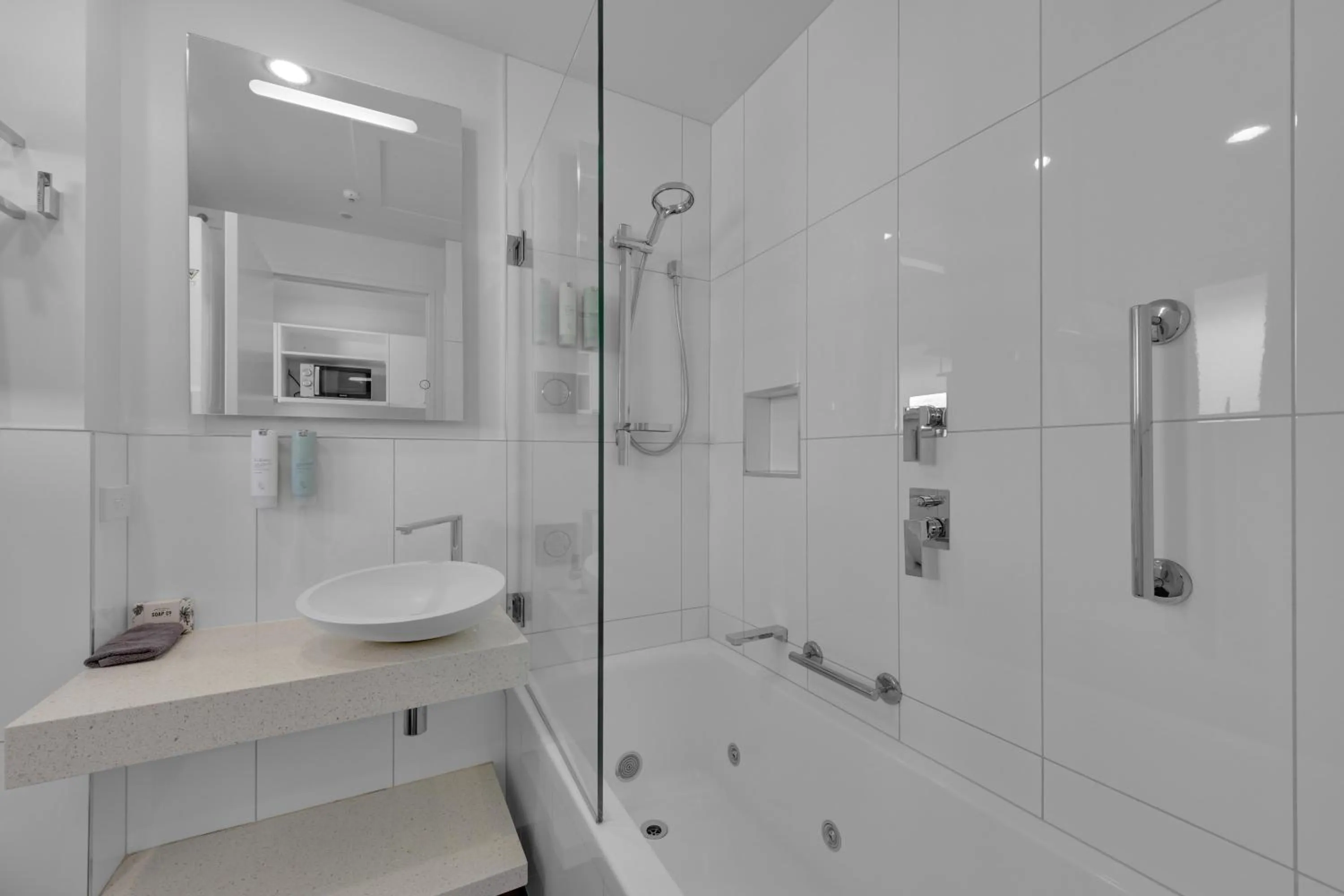 Public Bath in Delorenzo Studio Apartments