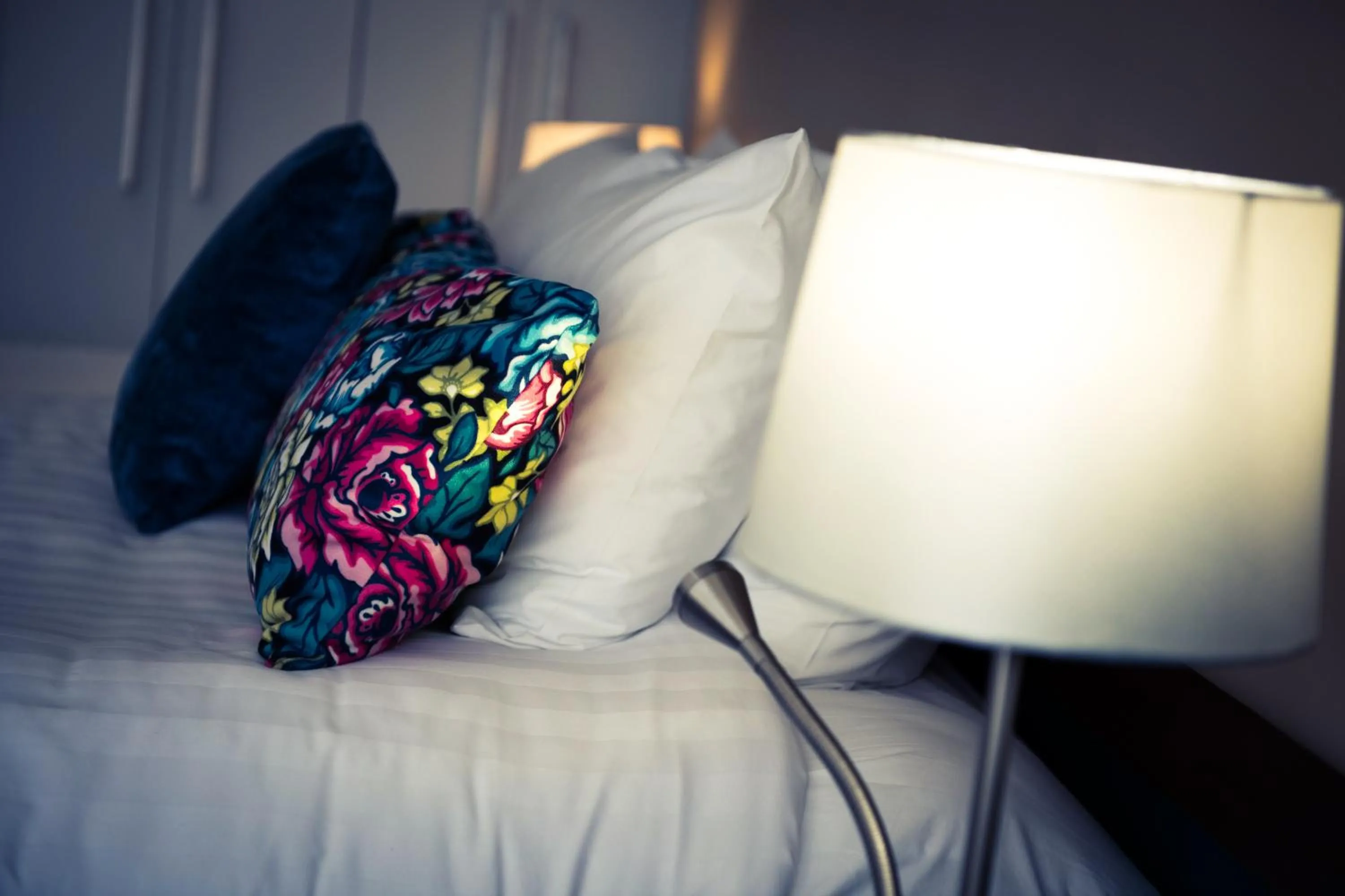 Decorative detail, Bed in Delorenzo Studio Apartments